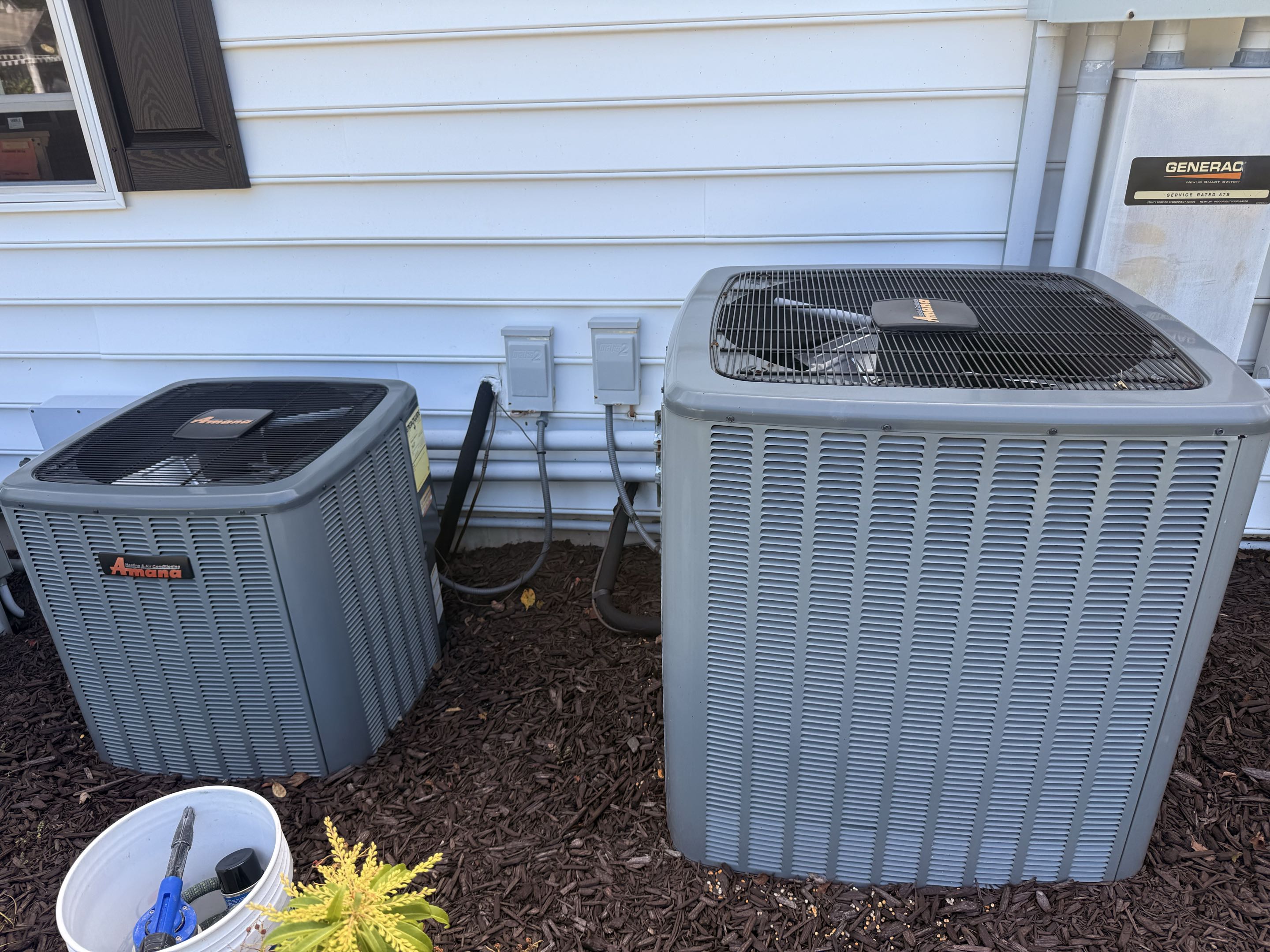 Routine maintenance on Buderus gas fired condensing boiler & Amana A/C Systems 