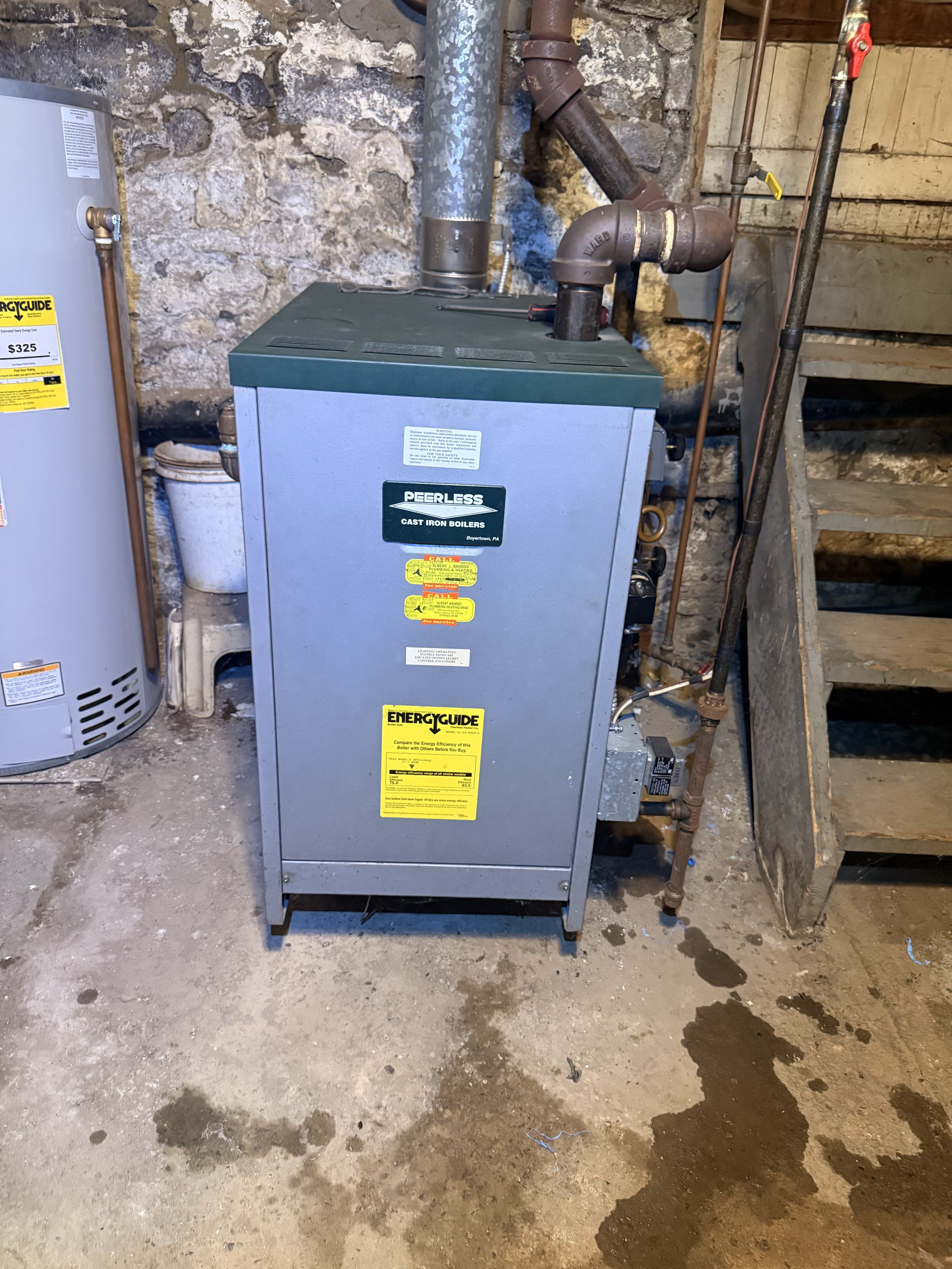 Routine maintenance on Peerless gas fired steam boiler & Mitsubishi ductless system 