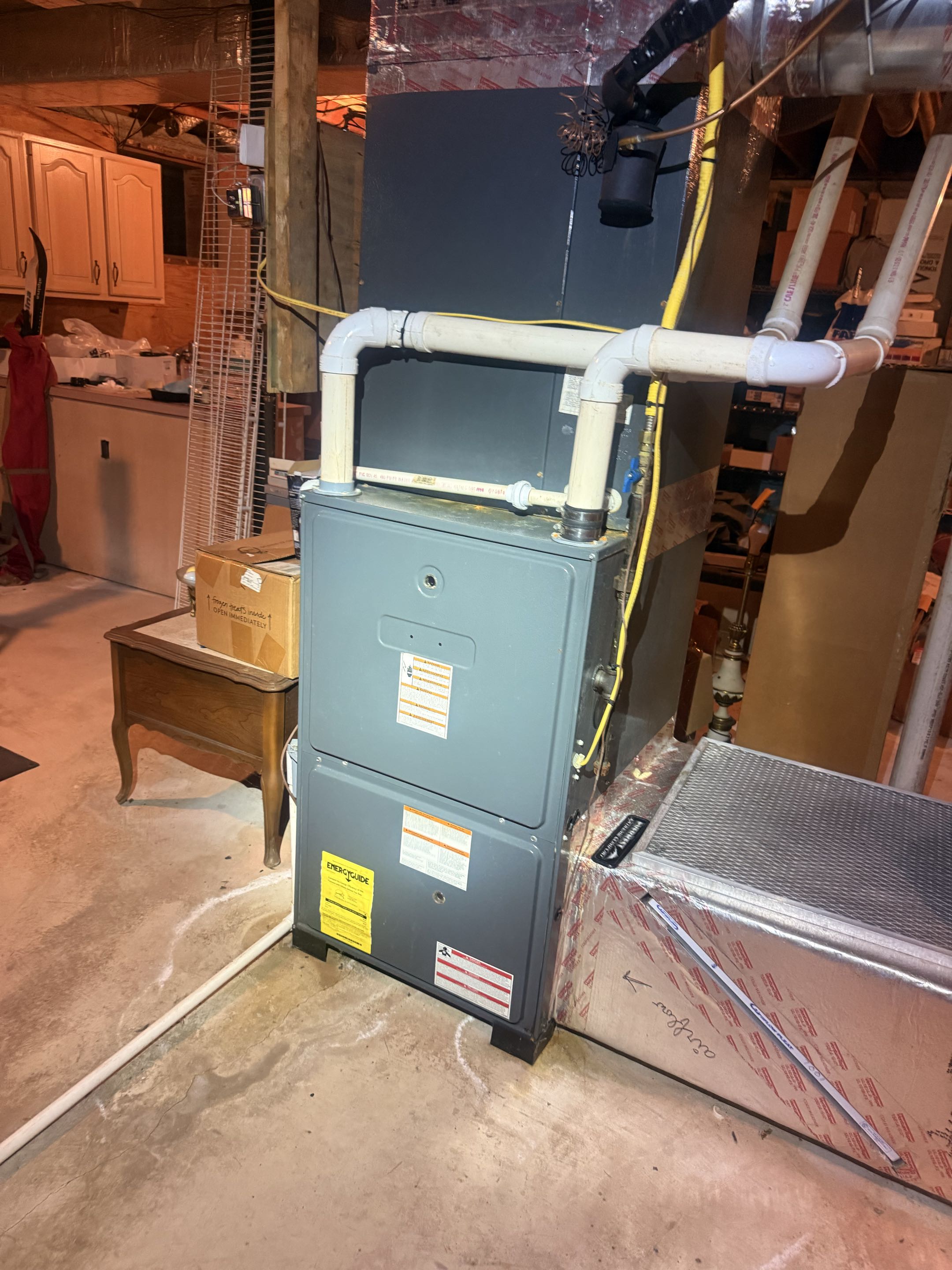 Routine maintenance on gas fired furnace & Amana tankless water heater 