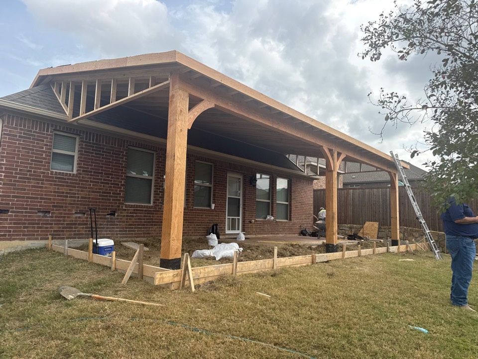 Day three of our new patio build over in Fort Worth. Adding a shingle Patio Cover concrete electrical and a TV/privacy wall.