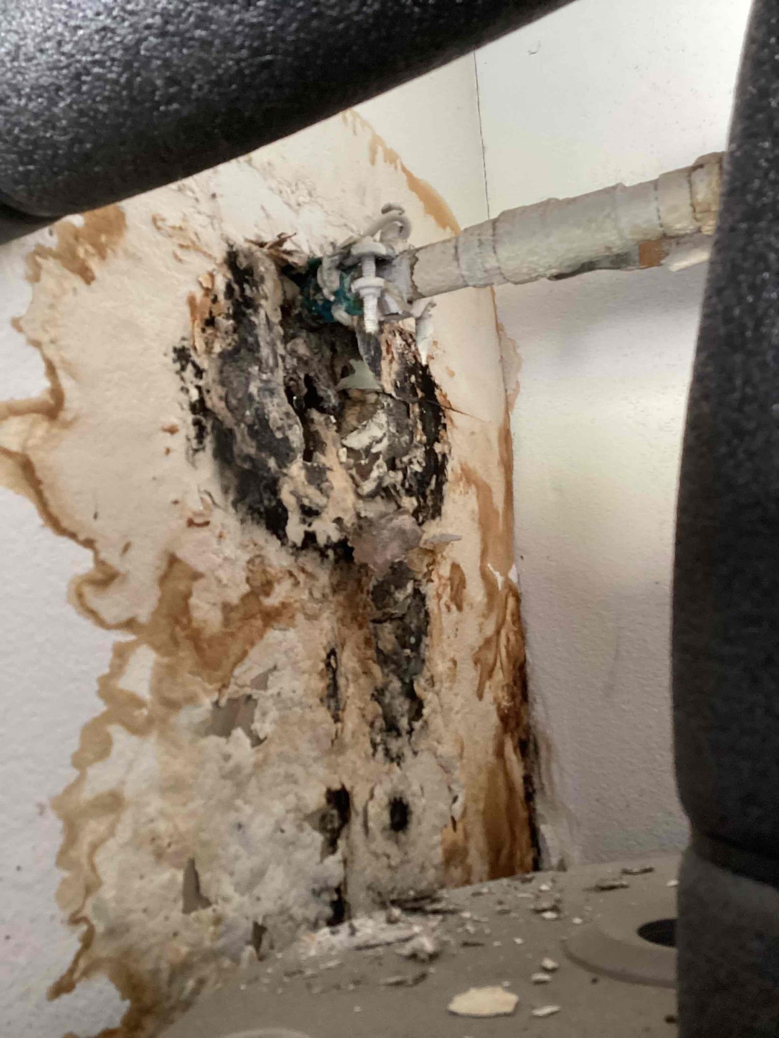We cut a section of drywall approximately 18/18inches .
Behind the water heater to repair the leak and. cut up to2 ft of 3/4”cooper pipe.
The work was done on the cold water line that feeds the water heater.
We’also replaced the shut-off valve on the water heater 