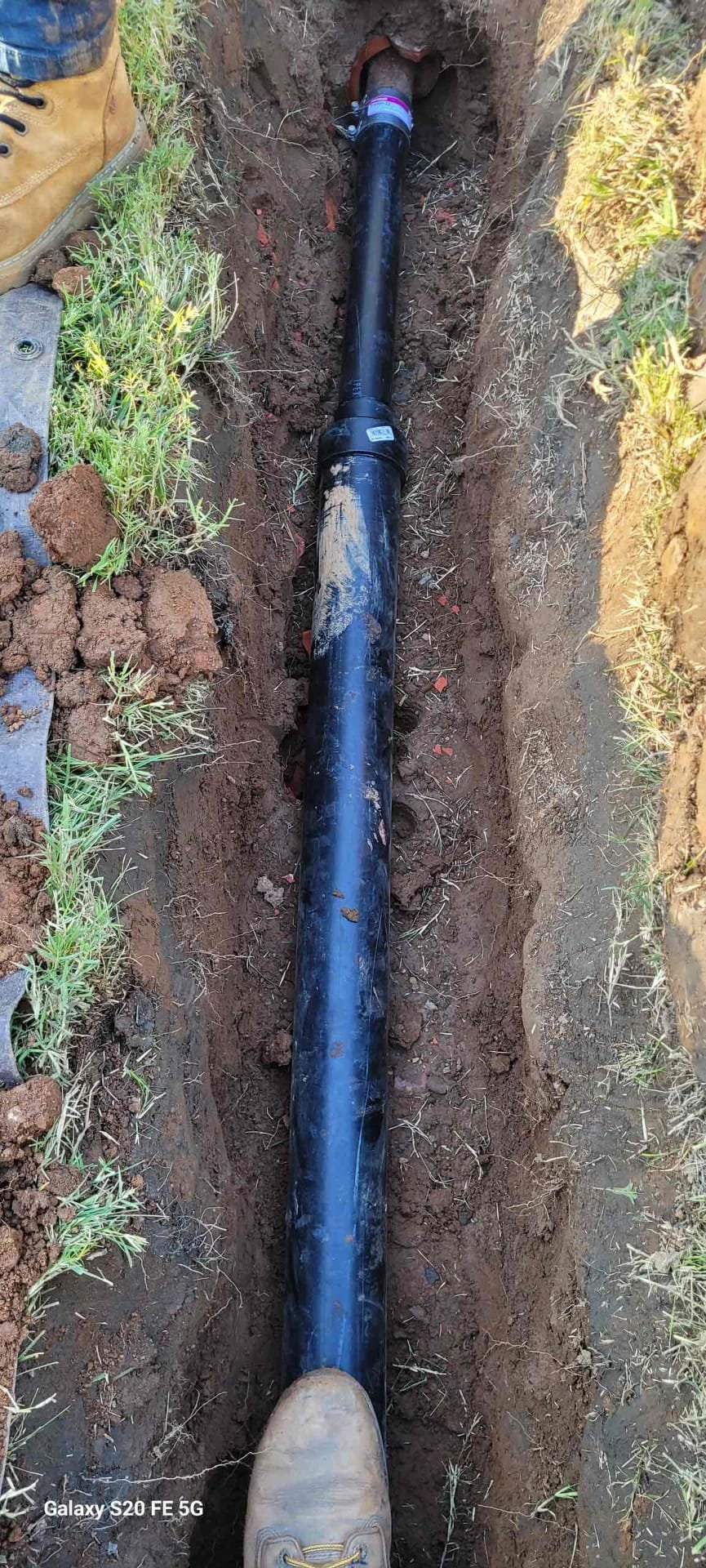 Customer has a 3’ section of old clay pipe that has roots and several offsets causing the laundry line to continually back up after several cycles are ran. Recommend digging this section up and performing repair 
Dug and replaced approximately 6’ of damaged laundry drain.  Customer has a 3’ section of old clay pipe that has roots and several offsets causing the laundry line to continually back up after several cycles are ran. Recommend digging this section up and performing repair 
Dug and replaced approximately 6’ of damaged laundry drain.