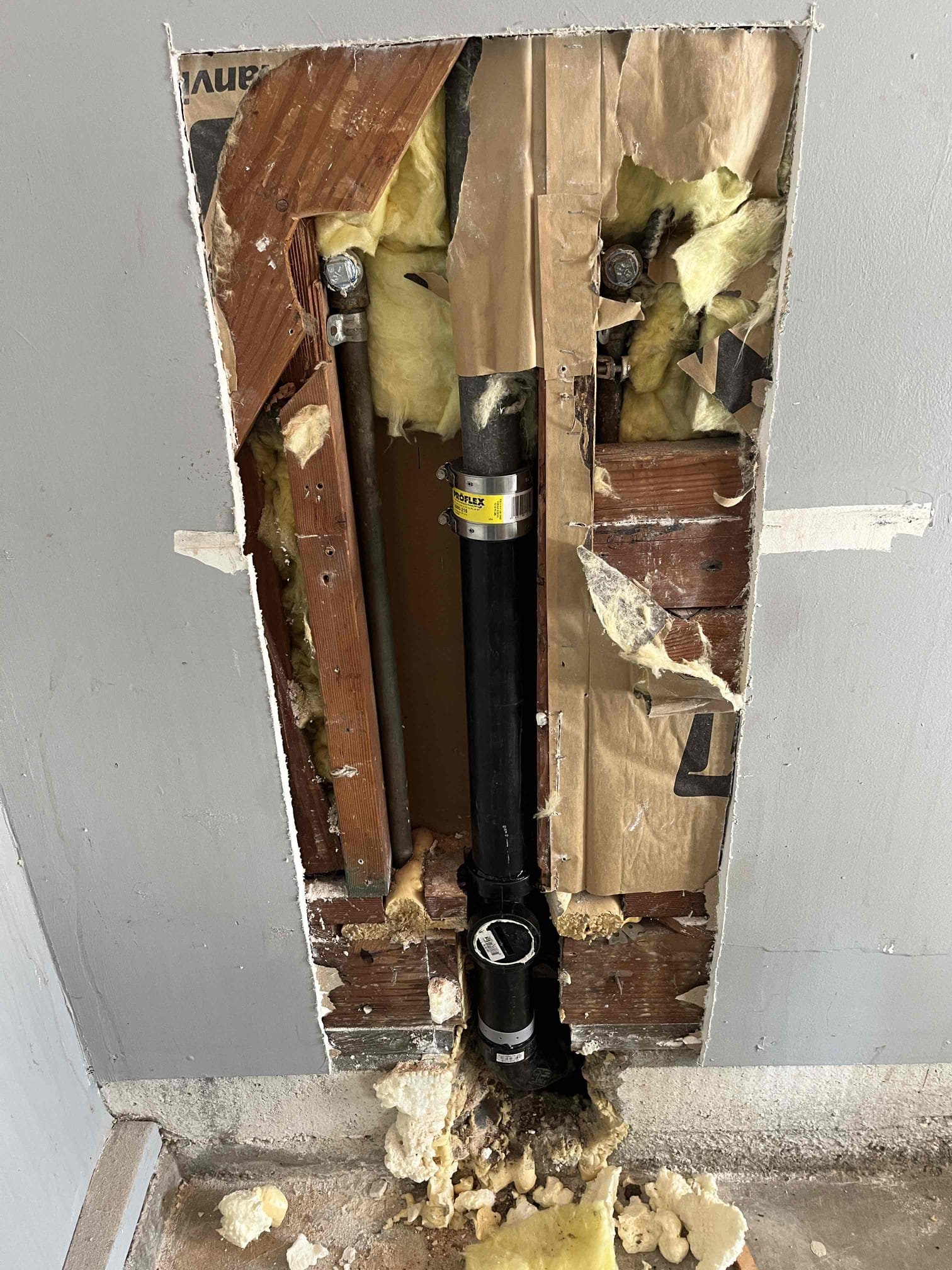 Customer wanted plumbing for garage sink to be removed and capped off in wall  Customer wanted plumbing for garage sink to be removed and capped off in wall