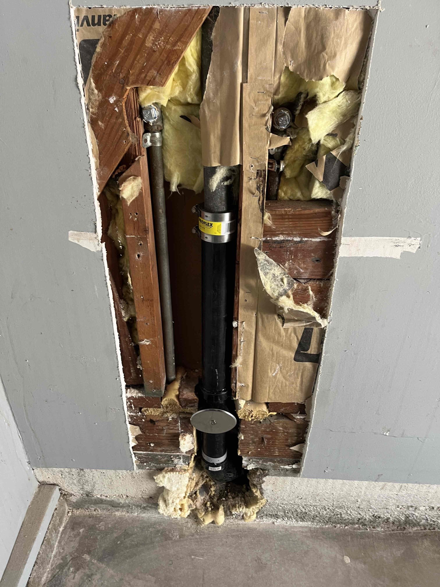 Customer wanted plumbing for garage sink to be removed and capped off in wall  Customer wanted plumbing for garage sink to be removed and capped off in wall