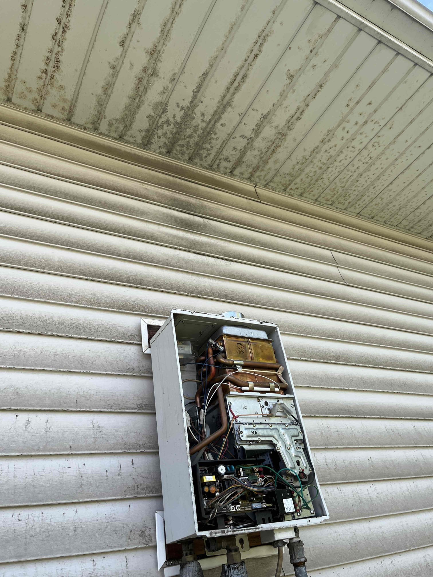 Customers existing exterior tankless water  heater is no longer functioning, contacted customer support and water heater heater is no longer under warranty and they no longer make parts to repair. Recommend replacing and bringing up to code with proper isolation valves to allow for future service of tankless  Customers existing exterior tankless water  heater is no longer functioning, contacted customer support and water heater heater is no longer under warranty and they no longer make parts to repair. Recommend replacing and bringing up to code with proper isolation valves to allow for future service of tankless
