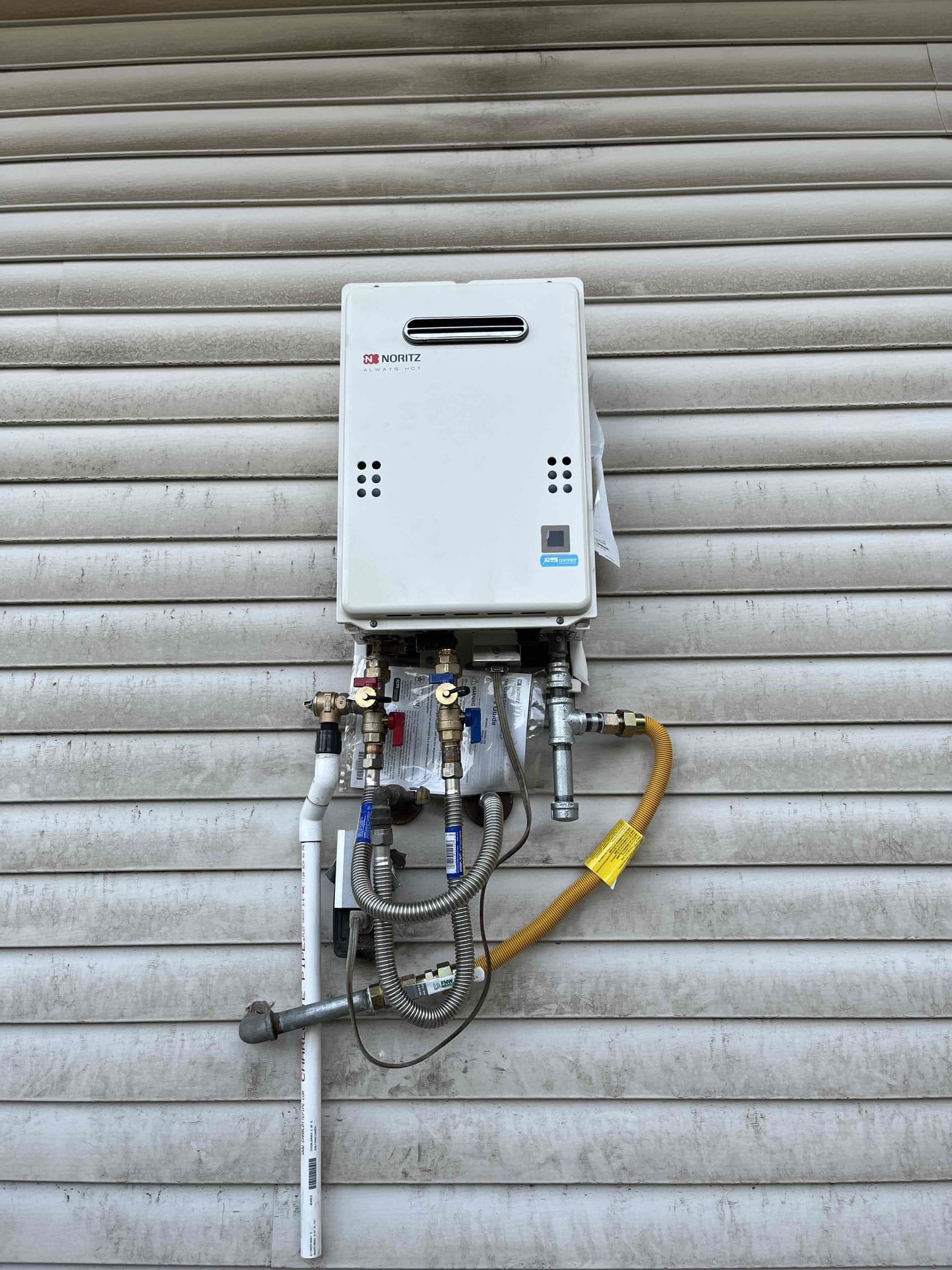 Customers existing exterior tankless water  heater is no longer functioning, contacted customer support and water heater heater is no longer under warranty and they no longer make parts to repair. Recommend replacing and bringing up to code with proper isolation valves to allow for future service of tankless 
Installed new Noritz tankless water heater  Customers existing exterior tankless water  heater is no longer functioning, contacted customer support and water heater heater is no longer under warranty and they no longer make parts to repair. Recommend replacing and bringing up to code with proper isolation valves to allow for future service of tankless 
Installed new Noritz tankless water heater