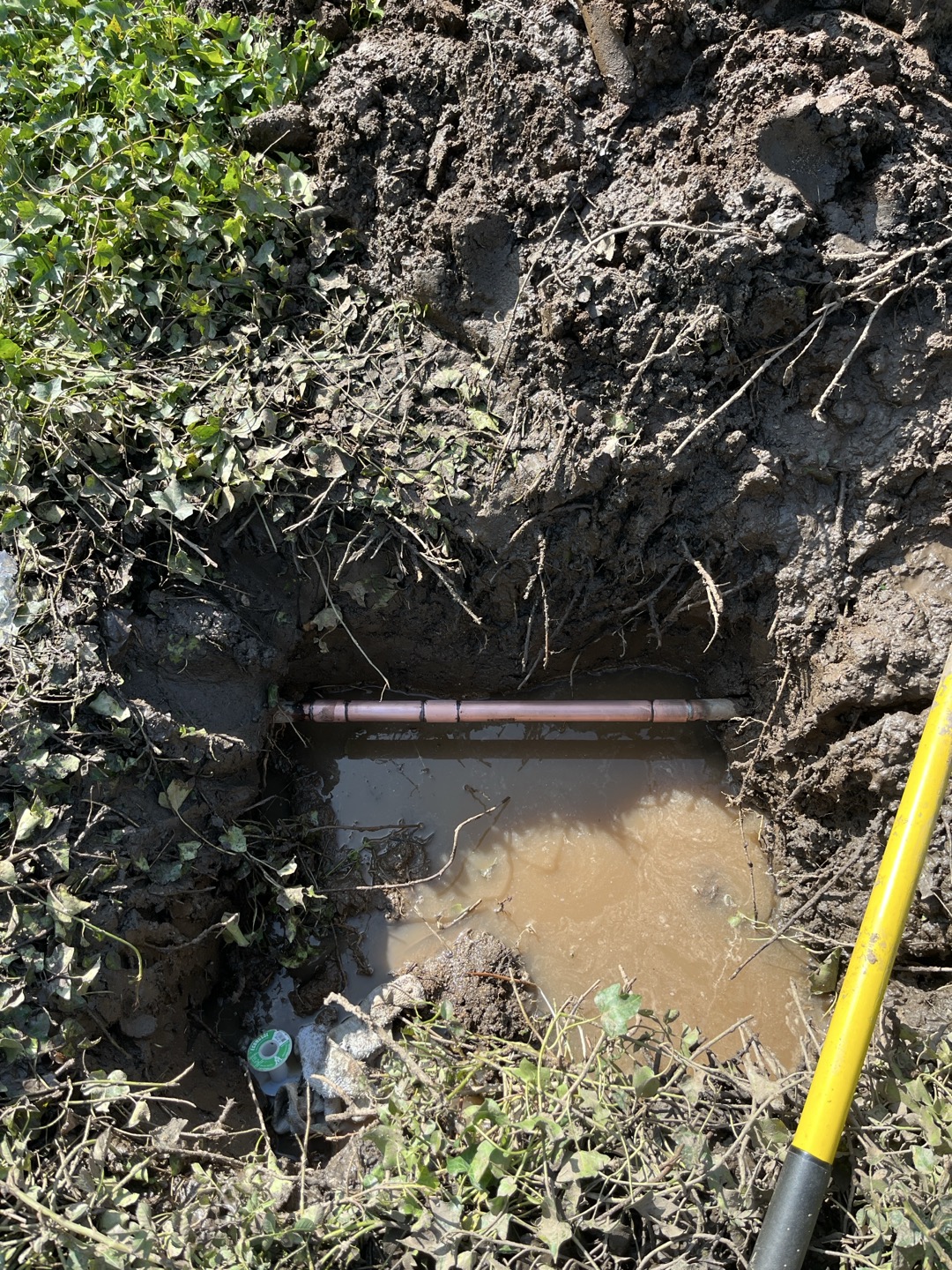 Customer has a 1” copper water main leak in front planter bed. Removed damaged section of pipe and plumbed in with new 1” copper pipe and fittings. Existing copper pipe was in poor condition, if customer continues to have issues recommend replacement 