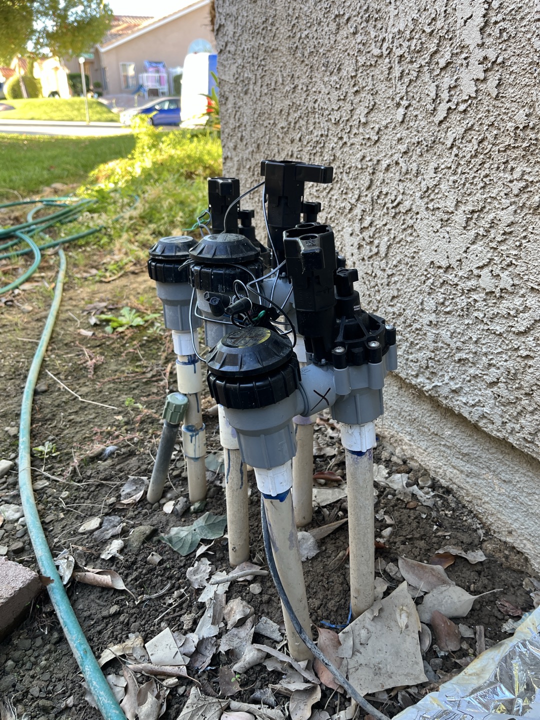 Performed inspection on potable water system. Checked meter a d saw that meter was spinning even water was not in use. After performing inspection I found that irrigation valve on side of home (right valve) was not shutting off all the way and was allowing water to continue to run to sprinklers. Shut this valve off and meters topped spinning indicating this was the only leak. Recommend having irrigation specialist switch this valve out 

Also performed inspection on low water pressure. Was able to determine cause being due to faulty regulator. When I checked pressure entering home pressure was only at 40 psi. Adjusted pressure to 75 psi but still recommend replacement of pressure regulator 
