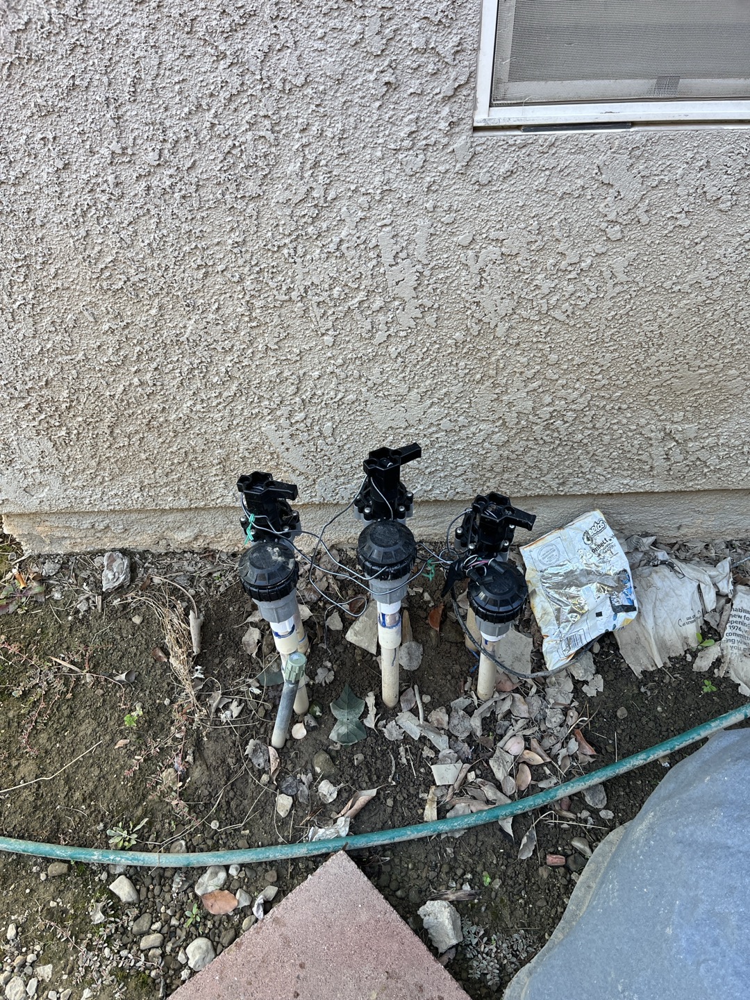 Performed inspection on potable water system. Checked meter a d saw that meter was spinning even water was not in use. After performing inspection I found that irrigation valve on side of home (right valve) was not shutting off all the way and was allowing water to continue to run to sprinklers. Shut this valve off and meters topped spinning indicating this was the only leak. Recommend having irrigation specialist switch this valve out 

Also performed inspection on low water pressure. Was able to determine cause being due to faulty regulator. When I checked pressure entering home pressure was only at 40 psi. Adjusted pressure to 75 psi but still recommend replacement of pressure regulator 