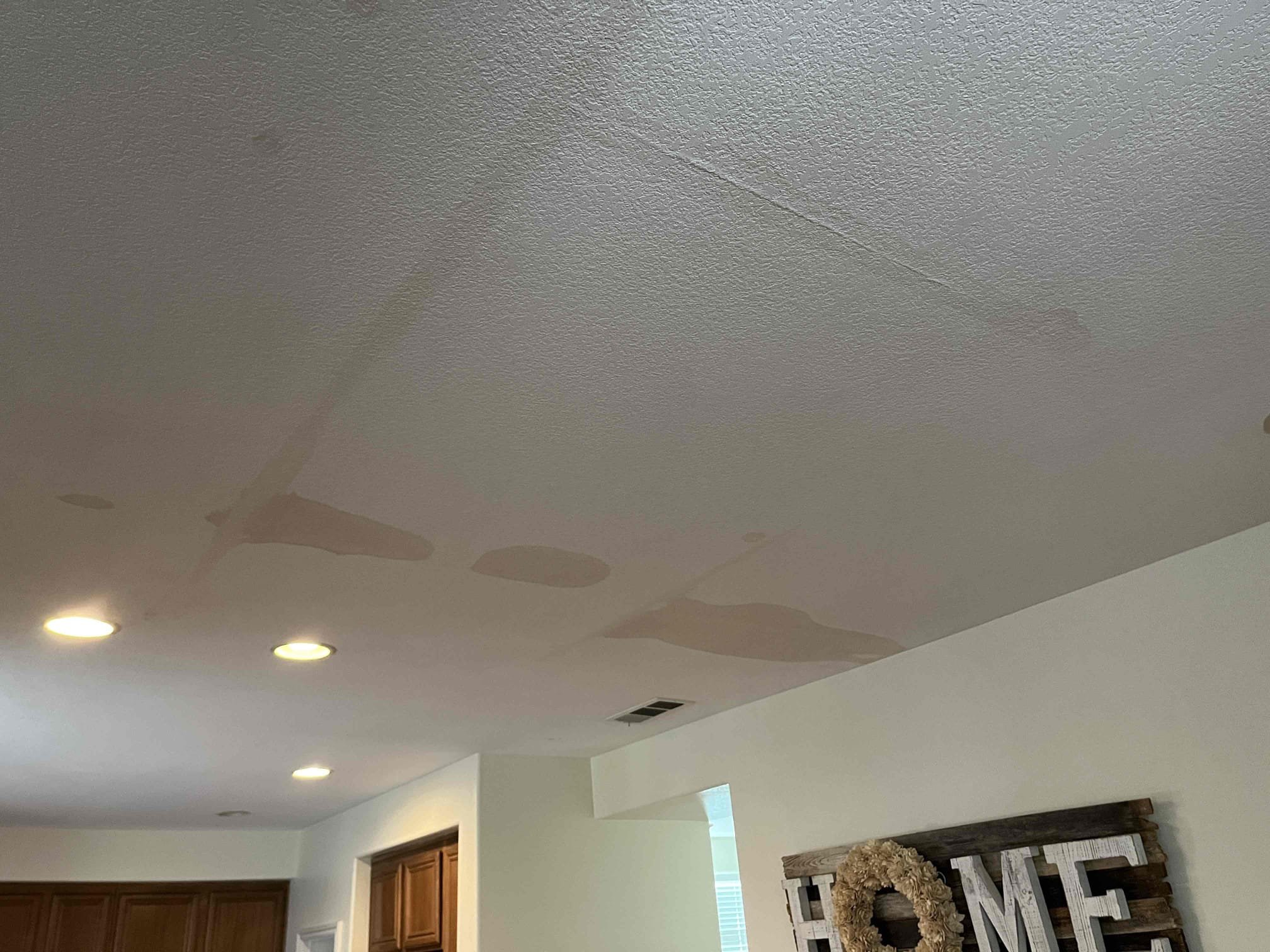 Customer has severe water damage to master bathroom as well as living room which is located below bathroom. Recommended performing propped mitigation to avoid further damage and mold growth. Upon performing moisture readings and inspections it appears in order to properly mitigate the water damage we will need to remove carpet padding in upstairs closets, master bedroom as well as remove bathroom vanirt and water damaged drywall in bathroom, closets and bedroom. We will also need to remove a majority of the drywall in the ceiling of the living room as well as flooring due to water already beginning to cause damage by bubbling the flooring. 