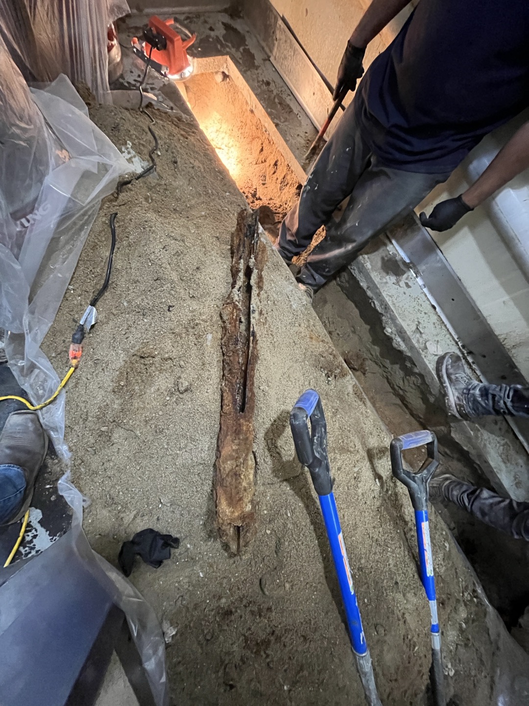 Performed camera inspection of drain line for sinks for kitchen, and found several sections where the bottom of the drain was gone. Ran camera all the wa to walk in freezer and was unable to get past the turn to see if there where any further issues. Unfortunately in this circumstance epoxy linning isn’t a viable option and recommend performing saw cutting and jackhammering of concrete to perform repair. In order to perform repair we will need to jackhammer and expose floor drain where clesnout is located as well as saw cut and jackhammer approximately 10’ in walk in cooler. This estimate is for performing repairs after hours 


Performed repair as outlined in invoice. Once we got to where the 2” lines drops down into the main we found that the line increased to 4” and 90 towards the unit next door. This section of 4” was completely missing bottom of the pipe. We attempted to tunnel as far as possible in attempt to find a good section of pipe to connect to but the bottom of the pipe wa