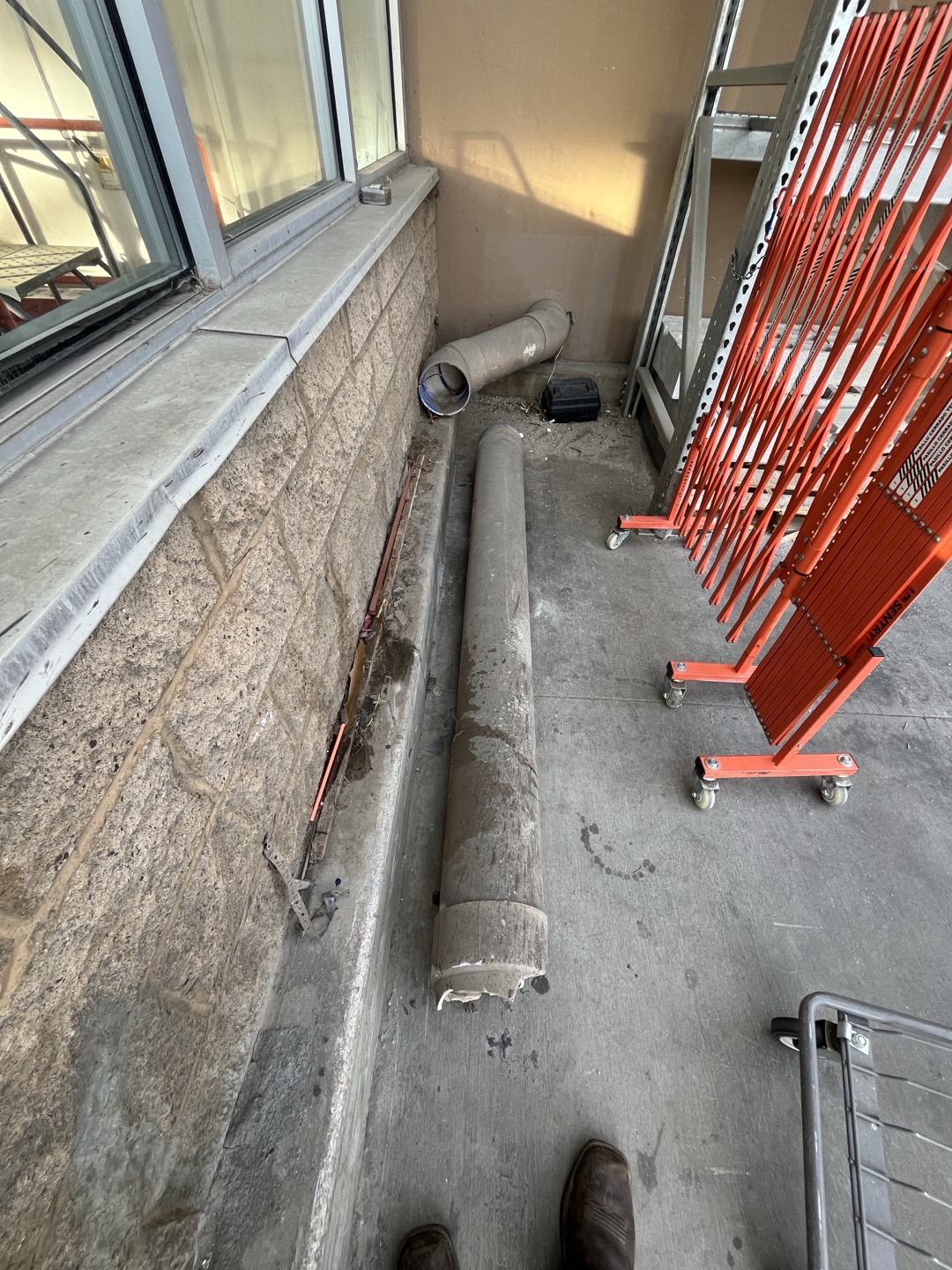 Customer has a 8” pvc roof drain they need repaired. Existing drain is cracked/ broken. The section needs to be removed and have a new section plumbed in to extend it out approximately another 10’ to terminate it near end of the curb. 