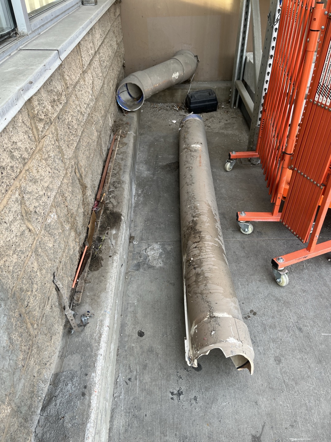 Customer has a 8” pvc roof drain they need repaired. Existing drain is cracked/ broken. The section needs to be removed and have a new section plumbed in to extend it out approximately another 10’ to terminate it near end of the curb. 