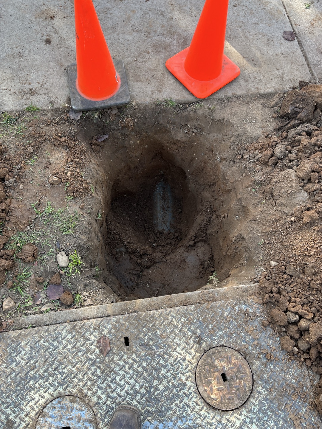 Customer needs estimate for installation of 6” backflow for fire system. Due to not knowing which direction the lines runs or depth of line it is difficult to provide accurate estimate to perform work. In order to provide accurate estimate we will need to dig and expose the fire line to determine path of travel, material of pipe, as well as o determine what connection, if any we will need to re establish. Once we know these things we can provide a more accurate estimate for installation of backflow. 


After exposing line we found that the fire line runs under the sidewalk at an angle almost parallel to the existing vault. Line is approximately 3’ deep 