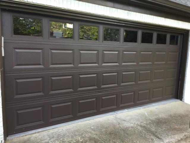 Installing CHI 2251 16ft x 6'9" insulated garage door with windows. Installing LiftMaster 8355W garage door motor and 7ft belt rail.