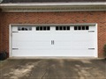 Installing CHI 5283 Short Panel Carriage Stamp, white, garage door with windows.  Servicing garage door.