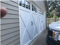 Installing CHI 5334 18'x8' garage door with arched madison windows. Installing LiftMaster 8500W garage door opener. Programming remotes and keypad. 