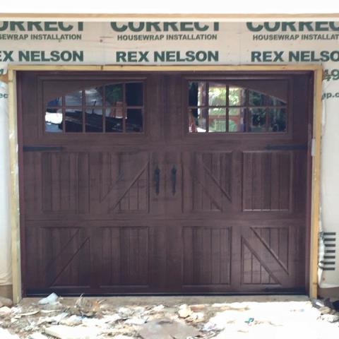 Customer is renovating their home and installing new amarr classica garage doors with new liftmaster 8550w's. These doors are 18x8 and 8x8 with windows and inserts in Mahogany color & decorative handles and hinges. These doors are also 3 layer insulated with steel back. 