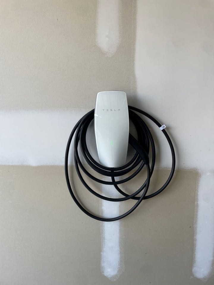 Tesla Level 2 charging station just installed in Fuquay-Varina, NC. Call Royal electric today for your free EV installation quote!