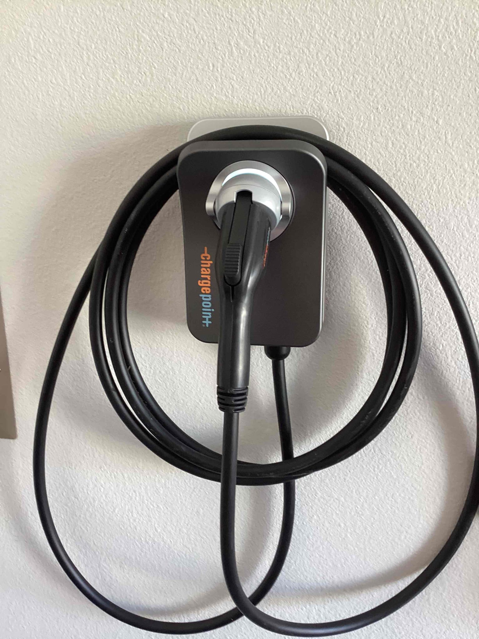 Arrived to install a EV charger in the garage. Hardwired the charge point charger and installed a 60 amp breaker to allow for 48amp charging. Had customer connect t to the new charger via app to finish installation and verify the charging ampacity is correct.