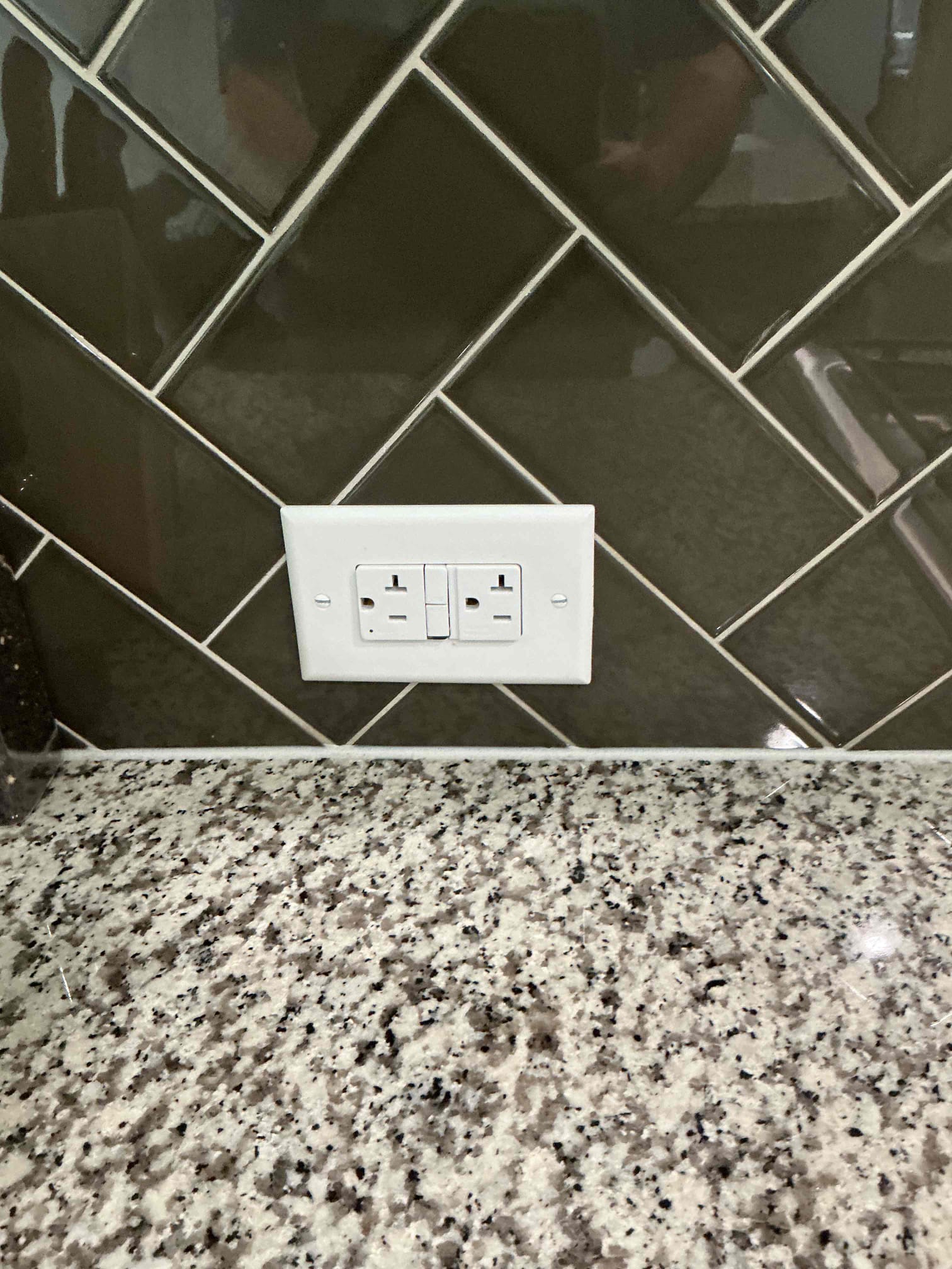 Replace customer supplied gfci in kitchen and everything works. Gfci is controlling the island plugs. No warranty on the gfci. There are no issues at this time. 