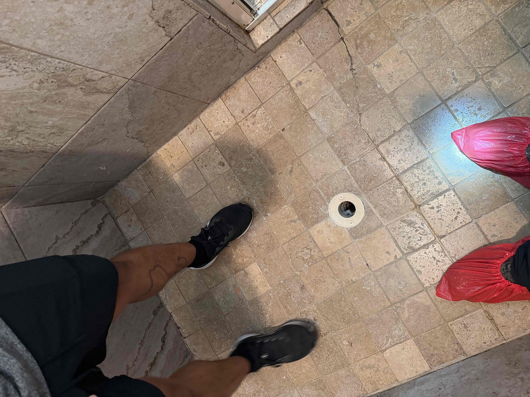 Attempt to restore flow to shower drain line using drain machine. No warranty on drain clear.  Attempt to restore flow to shower drain line using drain machine. No warranty on drain clear.