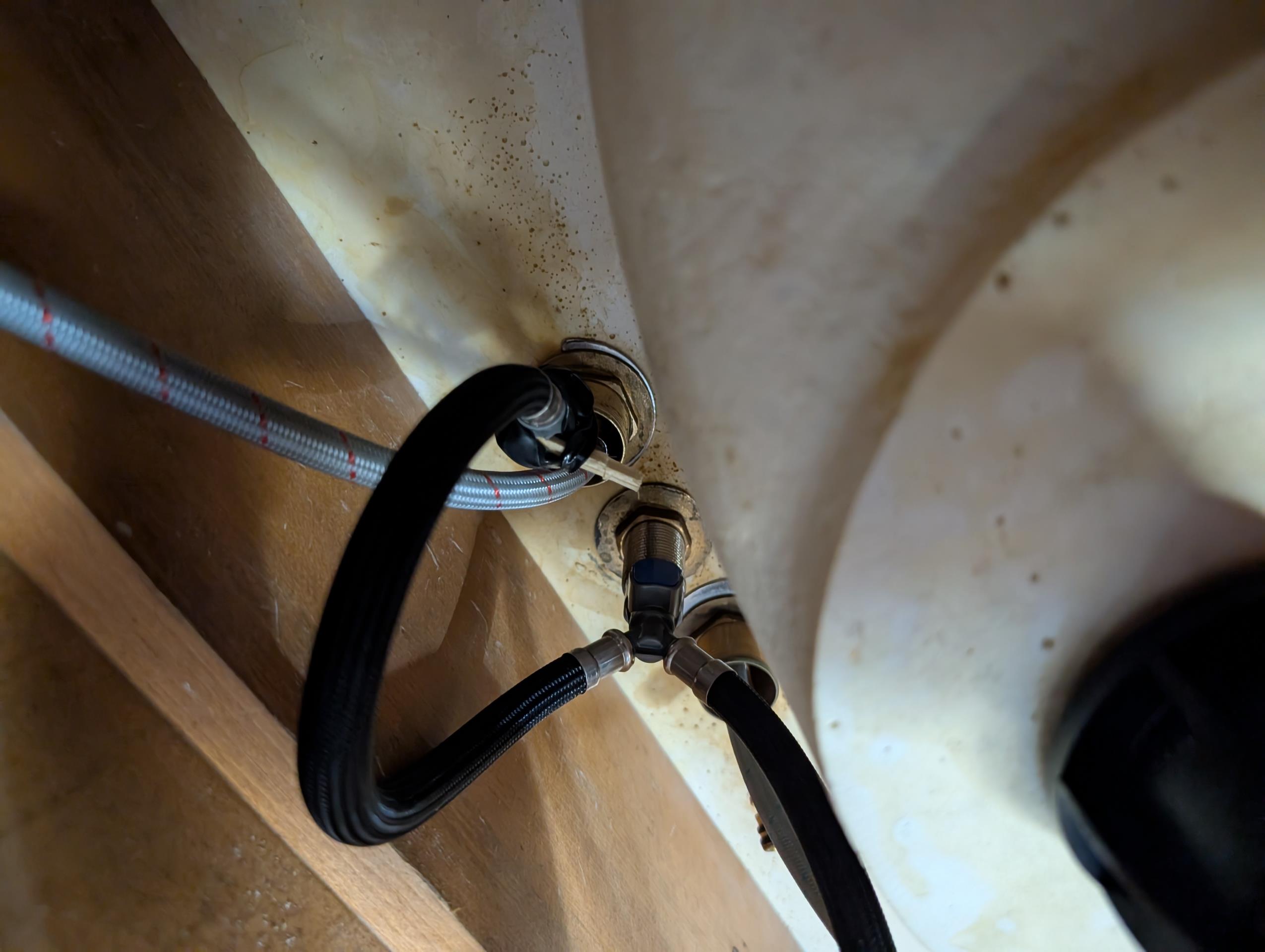 Install owner supplied lavatory faucet and two new shut off valves under sink in hall bathroom. 