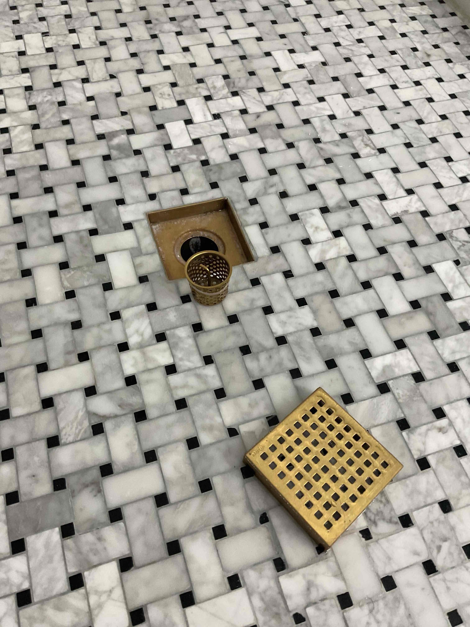 Removed strainer from shower drain and cleaned out hair. Re installed strainer and ran water. No warranty for drain clears.  Removed strainer from shower drain and cleaned out hair. Re installed strainer and ran water. No warranty for drain clears.