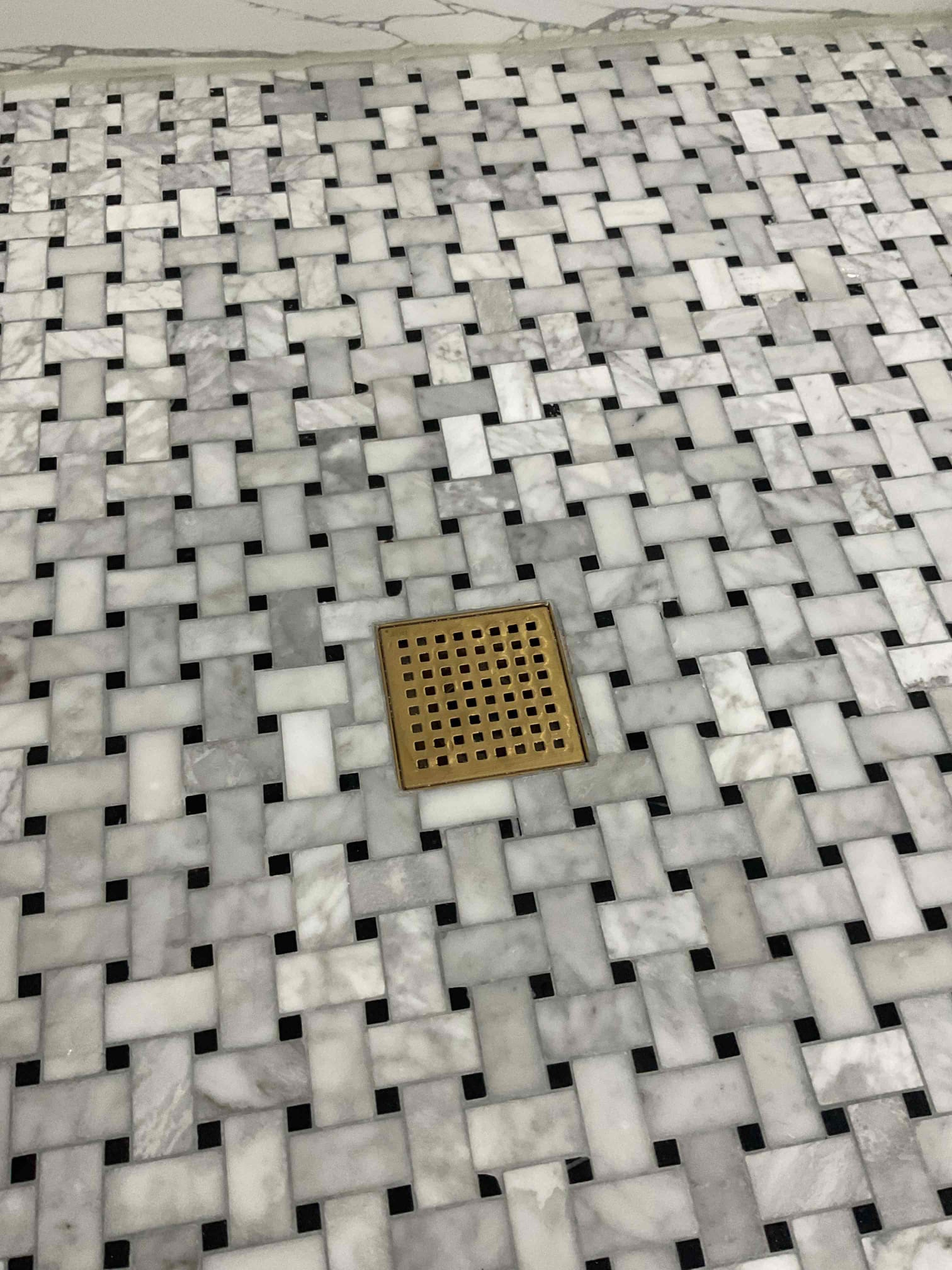 Removed strainer from shower drain and cleaned out hair. Re installed strainer and ran water. No warranty for drain clears.  Removed strainer from shower drain and cleaned out hair. Re installed strainer and ran water. No warranty for drain clears.