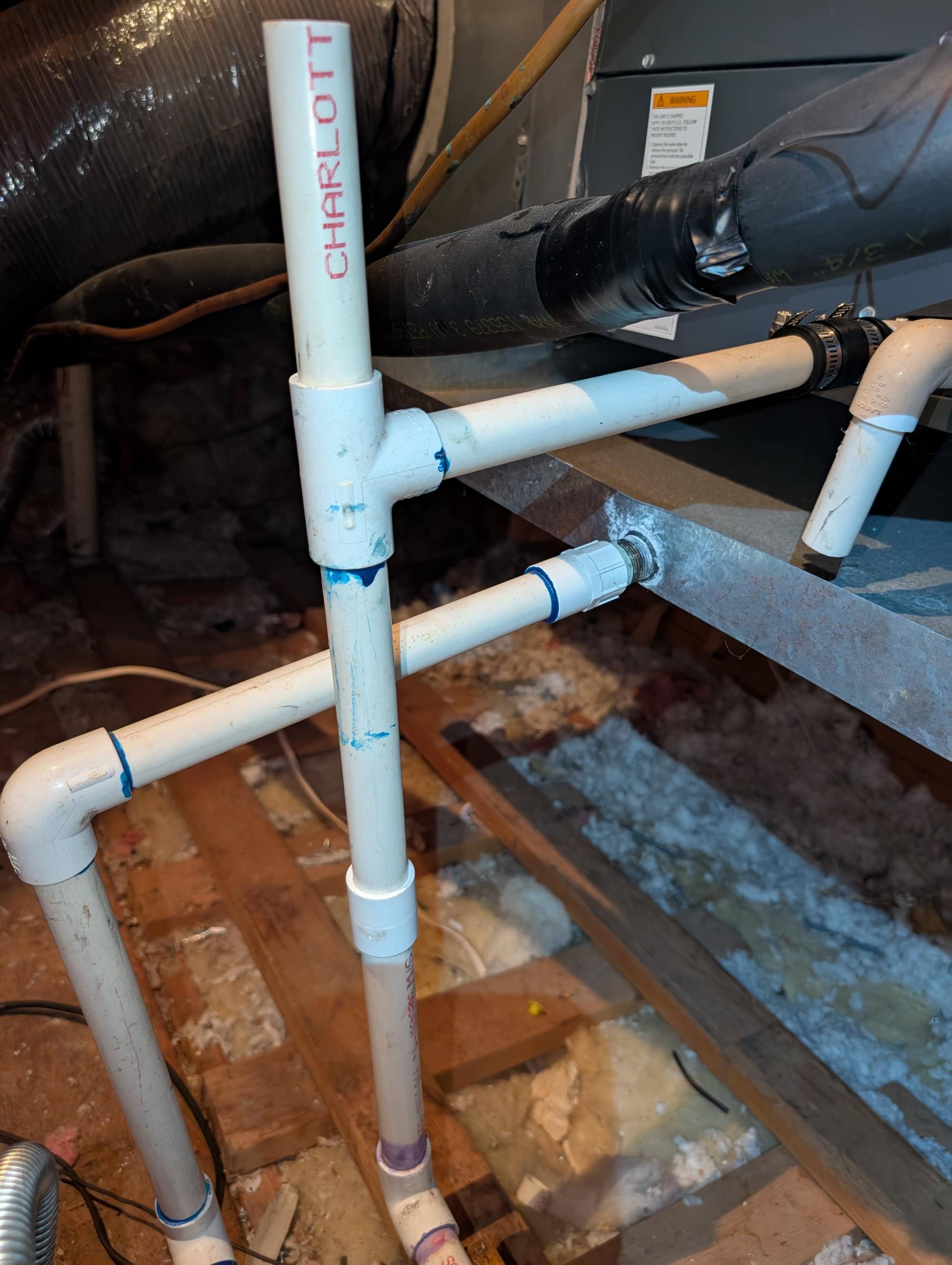 ATTEMPT to Unclog stopped up ac condensation line from attic unit to upstairs J/J restroom.

No warranty on drain clear!
Replace attic section of piping to prevent future clogs from stacked fittings restricting flow of ac condensate. 

5 year warranty on work!