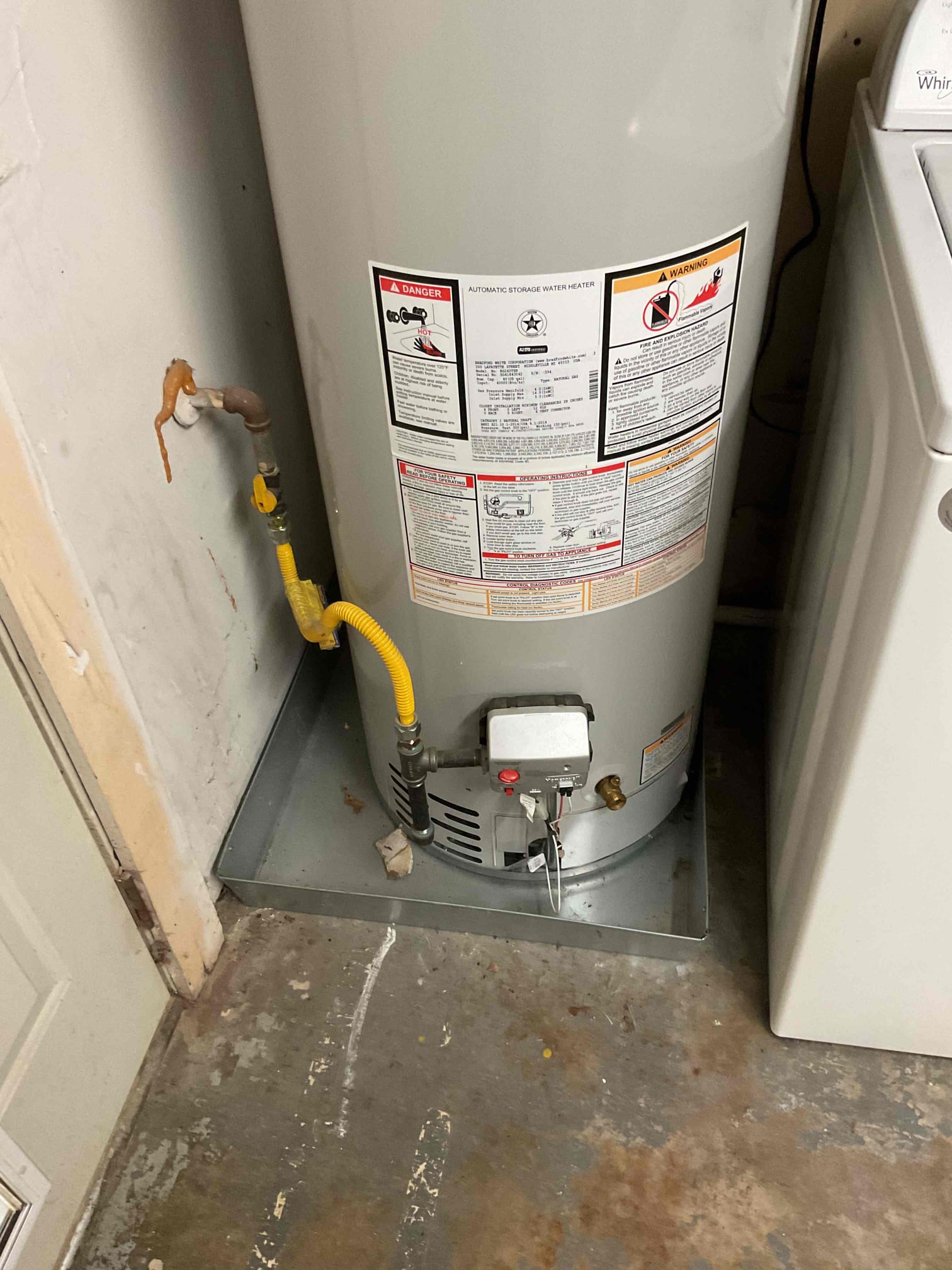 Attempt to restore flow to vanity sink drain, Remove corrugated drainage and replace ptrap. Perform all maintenance on water heater, replace anode rod and perform drain down/flush. 