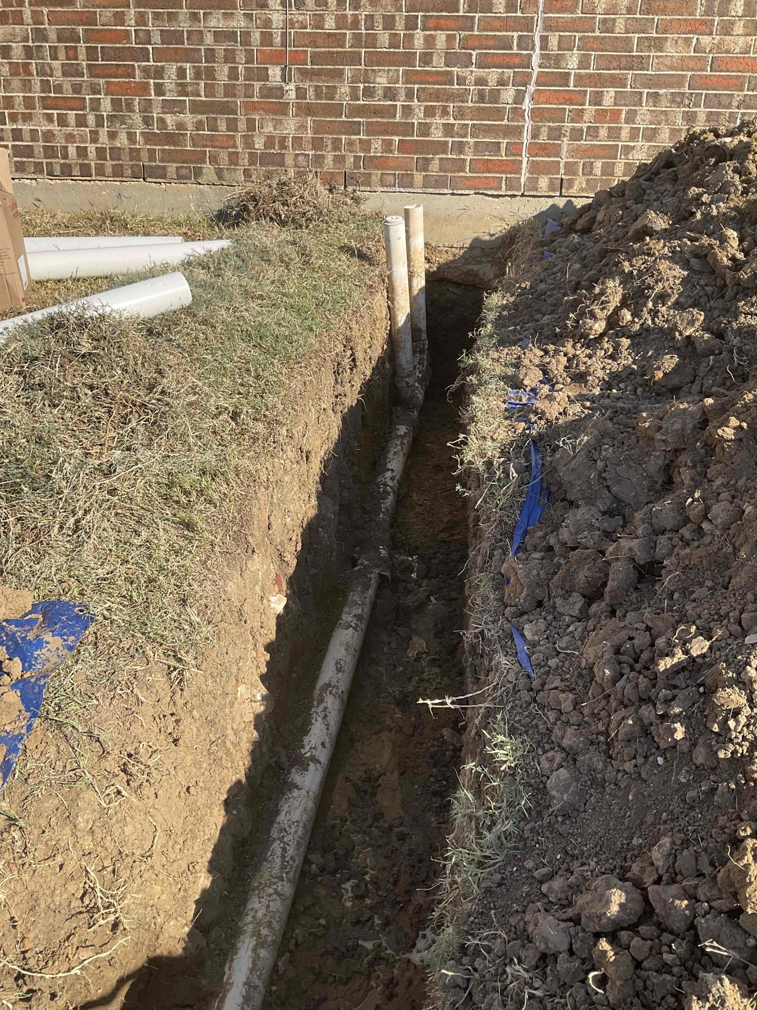 Trench and repipe sewer yard line in new schedule 40 pvc according to international plumbing standards 
Backfill and compact
Pull and reset toilet ( hall bath )
15 year parts and labor warranty 

Test all work no leaks office will schedule inspection