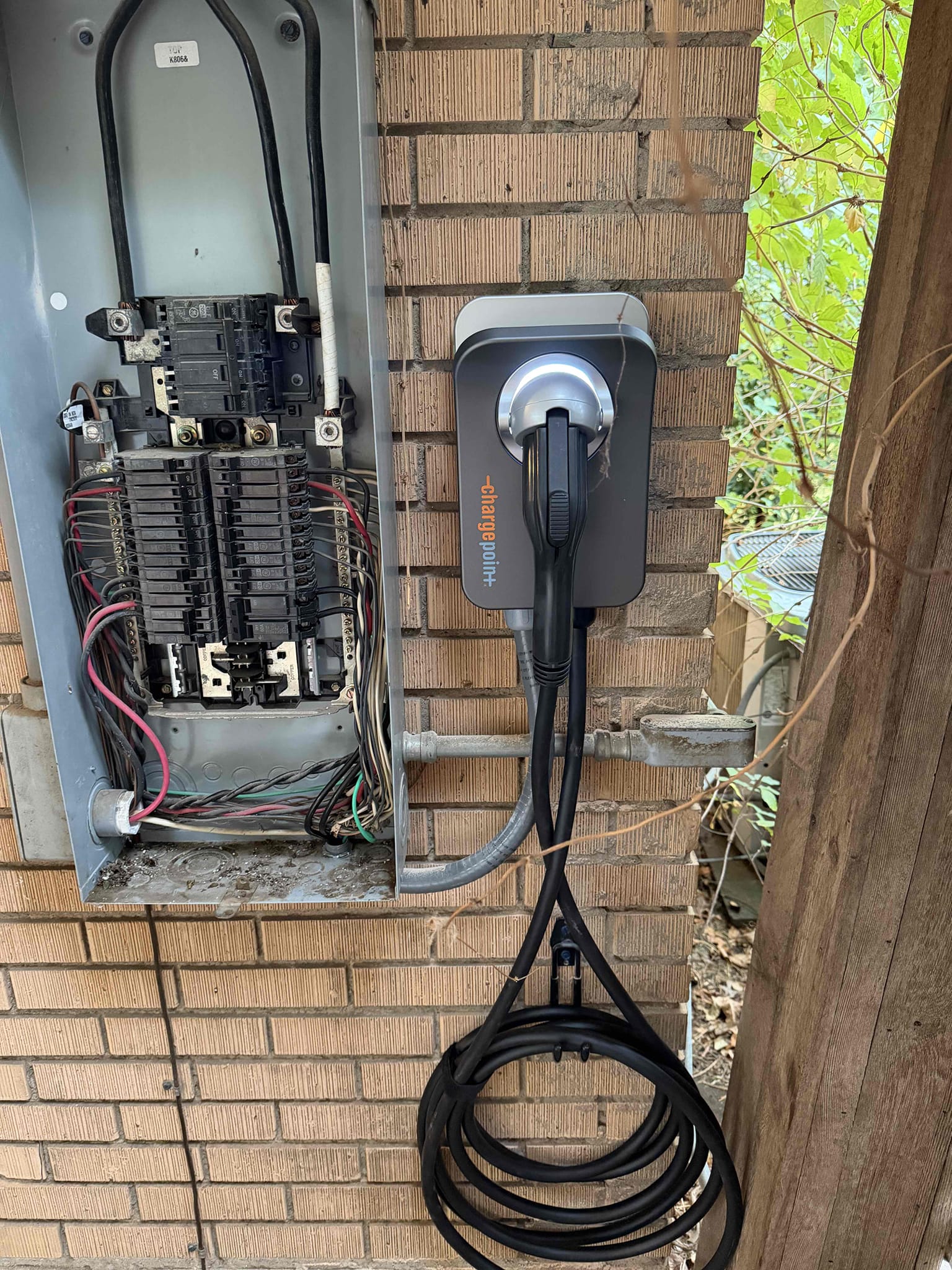 8-11 
Friday morning 
Installing ev charger to the right of ge thin panel 
Ran dedicated 60 amp circuit from panel into EV charger right next to panel. 8-11 
Friday morning 
Installing ev charger to the right of ge thin panel 
Ran dedicated 60 amp circuit from panel into EV charger right next to panel.