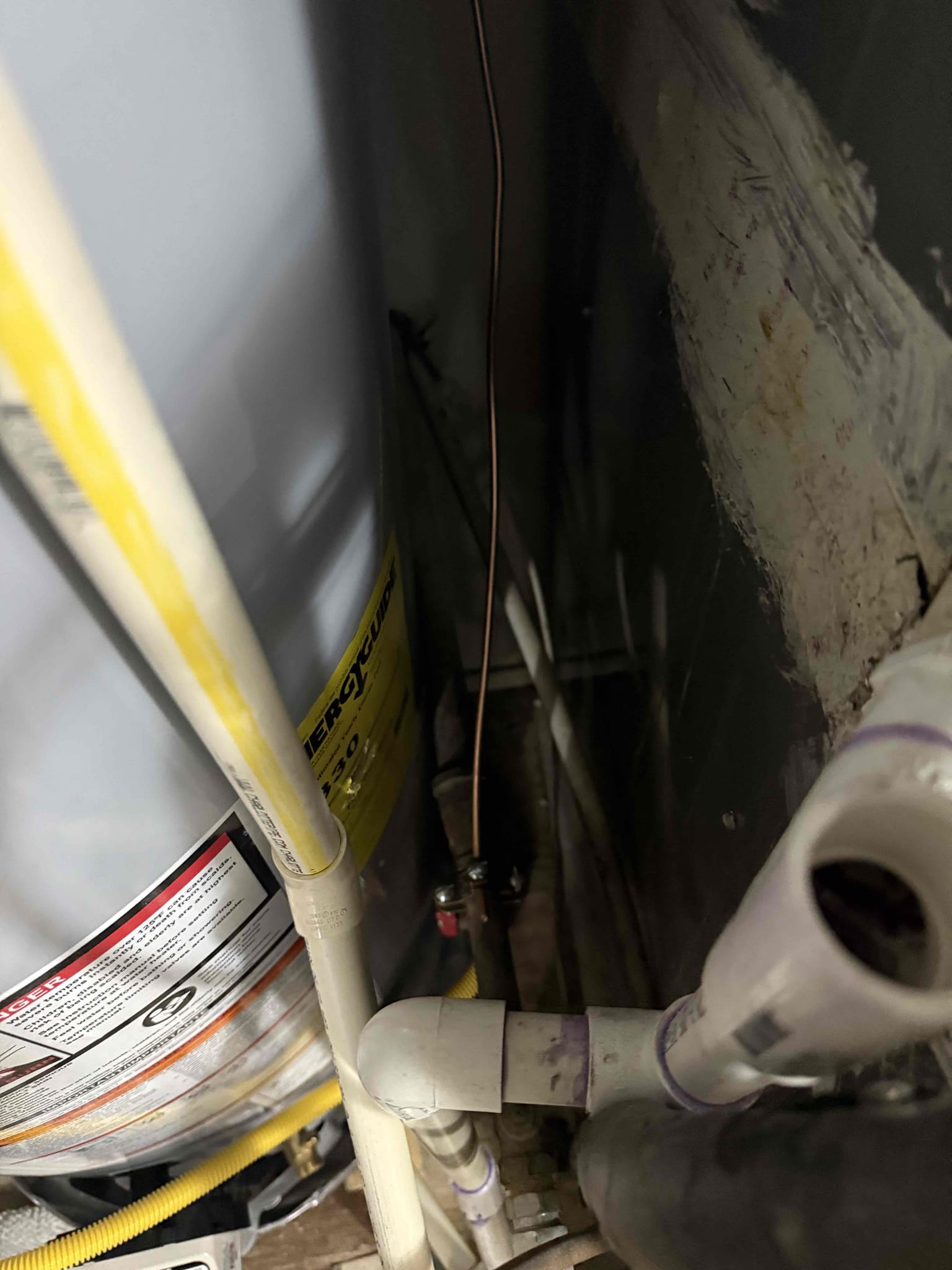 Met inspector onsite and he requested that we extend the water heater bond to include the gas line. Installed a permanent crimp on the wire and ran a new piece of wire down the the gas line with a clamp. Emailed photos to inspector to finalize the inspection.