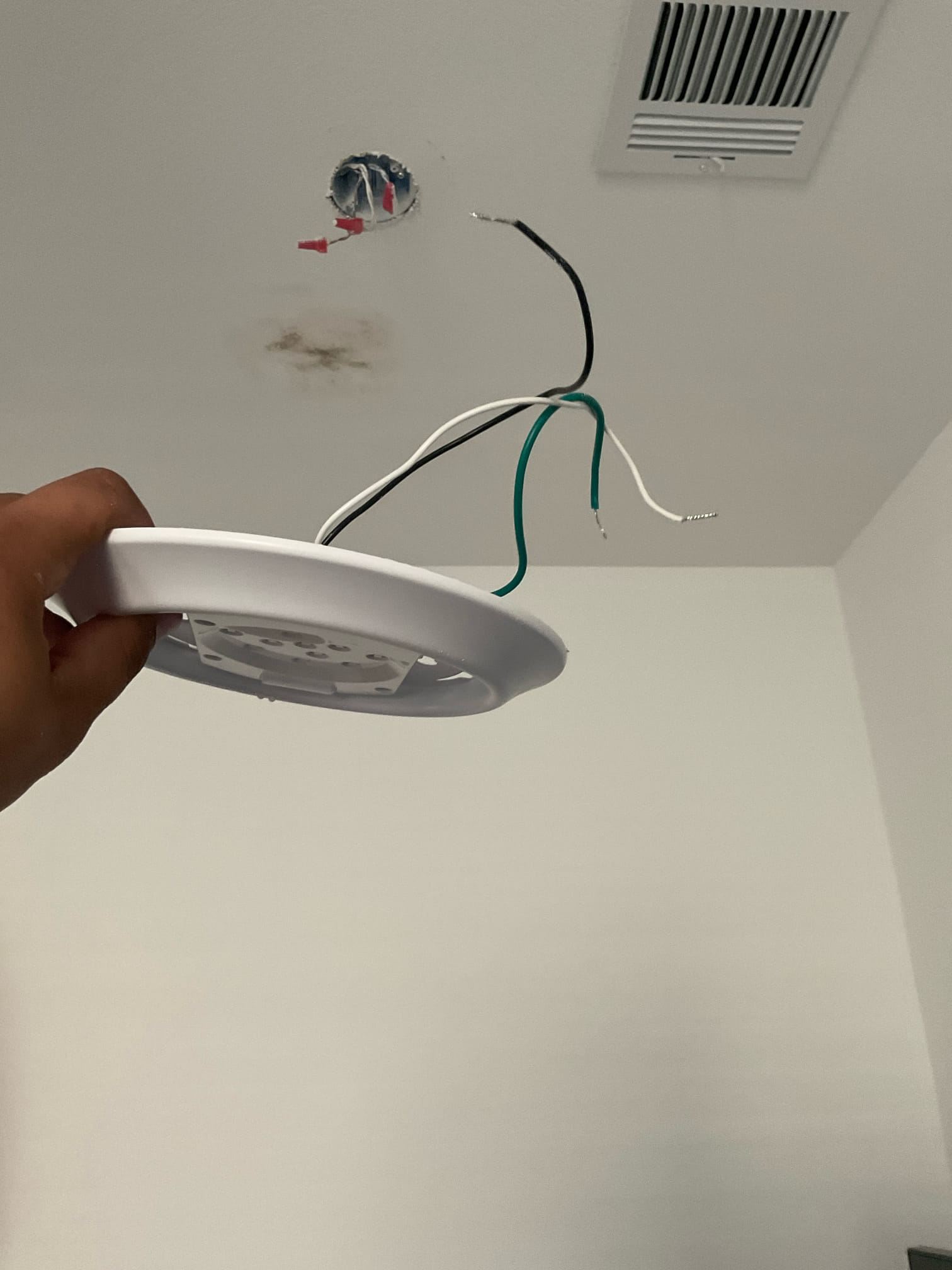 Arrived on the job site, and the customer stated that their AFCI breaker was consistently tripping. I offered to perform a full circuit troubleshoot, but the customer declined. During the safety evaluation, I noticed a wet spot on the ceiling near a 6-inch surface-mount light fixture. I informed the customer that this moisture could be contributing to the breaker tripping. The customer agreed to proceed with diagnosing and replacing the light fixture only.

While replacing the fixture, I observed significant water damage on the old light. I inspected the connections and confirmed that the wiring and junction box were dry and free of water damage—the moisture was isolated to the fixture itself. After installing the new surface-mount light fixture and restoring power, the breaker remained on and everything operated properly.

I informed the customer that the new fixture is covered by a five-year warranty. However, if the AFCI breaker trips again and it’s unrelated to the light fixture, a