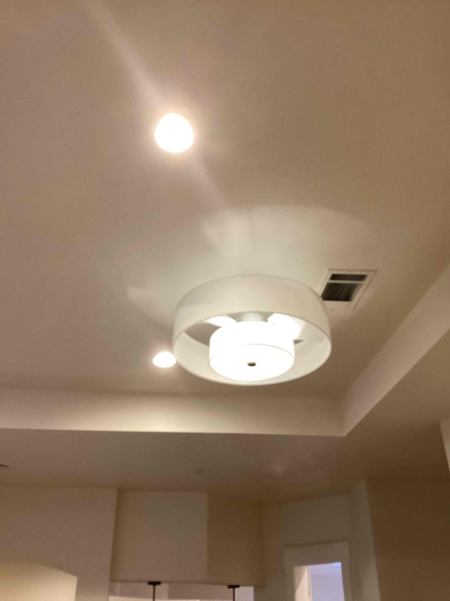 Arrived to warranty the outlet at the top of the stairs as it lost power after an outlet was removed previously by us. Through investigation I found that the neutral behind the outlet around the corner had been capped off and the hot was left energizes. Rewired the back of the outlet box so the correct wires were capped off and the wires needed were energized. While there the homeowner also had two fandelier to install so I mounted those as well.