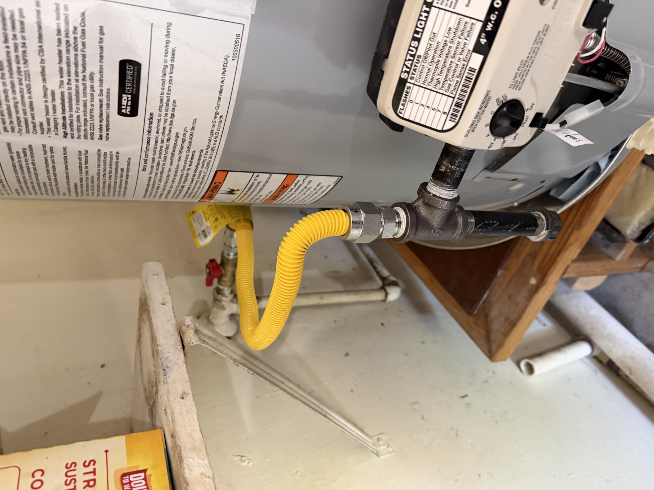 Install new 50 gallon water heater with new flex lines, ball valve, exhaust flue, gas flex line and drain pan. Also trap a high loop into the dishwasher discharge line.
Installed 50 gallon, gas water heater and customers garage with a new hot and cold for Port bar valves, new gas, flex, line and gas shut off valve new pan, pan, drain and TNP line. Five year warranty on parts and labor paid with card. Job complete.  

* customer stated that the gas was shut off to the home due to complications from the previous owner of the home so currently the gas is off to the home.*