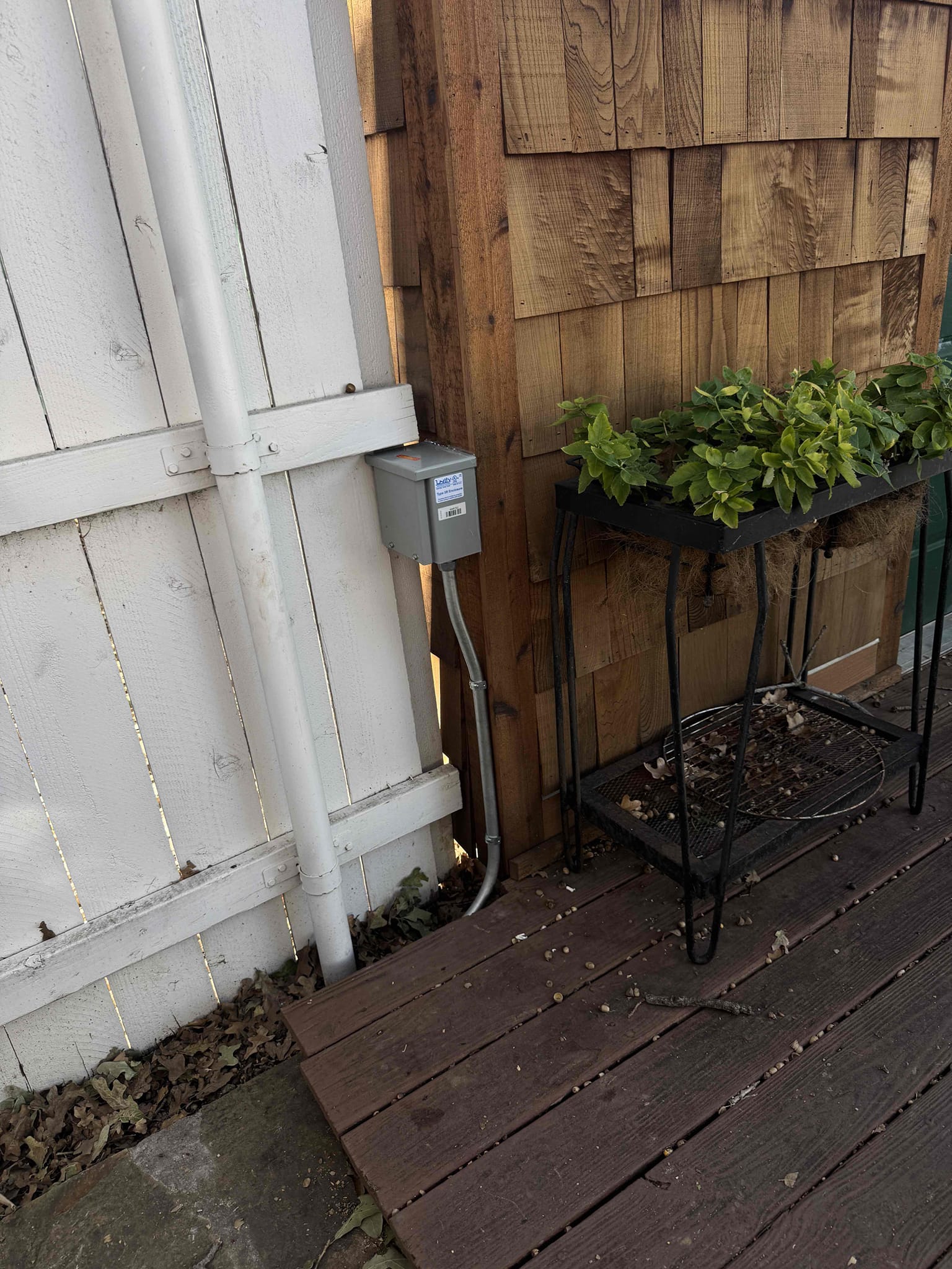 Pull all city permits and inspection, install overhead main electric service (lifetime warranty), install weatherproof main breaker panel next to meter (lifetime warranty), combine outdoor sub panel circuits into main panel, install whole home surge protection on main panel - 108k amps protection (lifetime warranty), install battery powered smoke detectors in bedrooms and hallway in main house, run new 240 volt 40 amp 3 wire feed to garage and install sub panel (lifetime warranty), run new 240 volt 100 amp 3 wire feed to guest house via trench and surface mounted conduit under porch roof, relocate circuits back to back to guest house porch and install weatherproof sub panel (lifetime warranty)