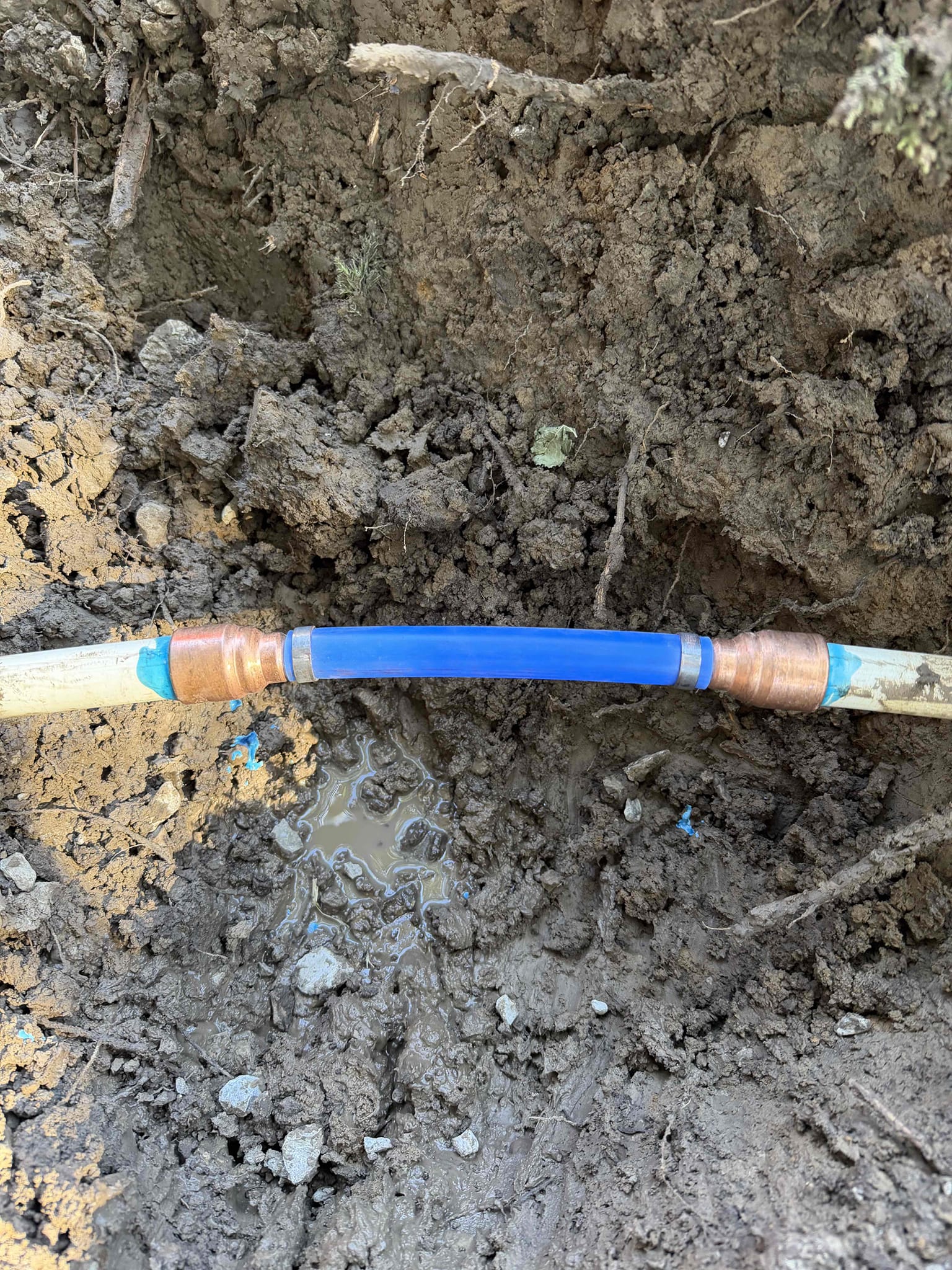 Performed waterline spot repair on three-quarter PVC in front yard to the right of the driveway. Paid with card. Job complete.