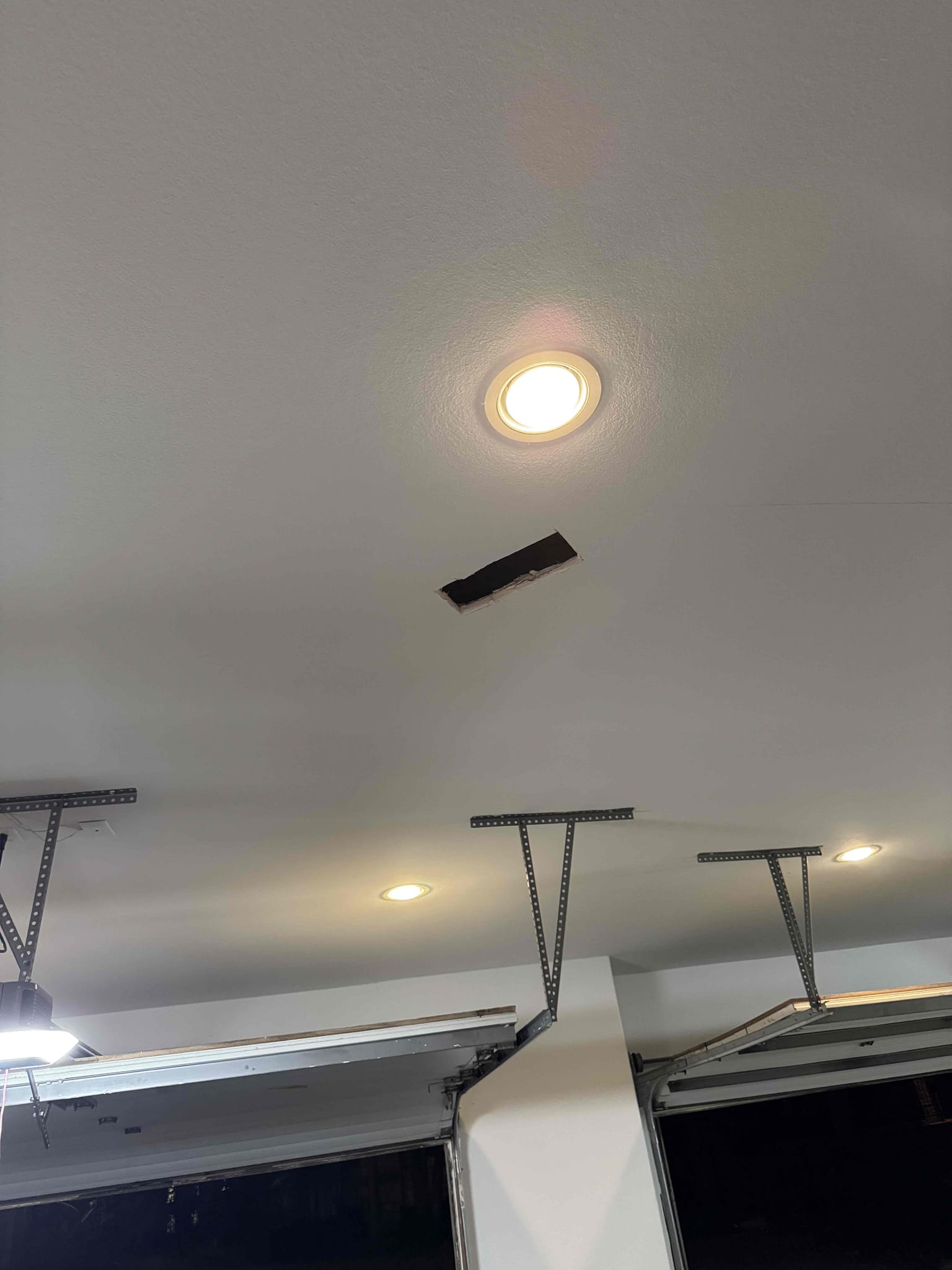 -Arrived on site and spoke with the customer, who requested the installation of a car charger in his third-car garage. I noticed there is an existing 240V outlet circuit for a steamer located in the attic above the master bathroom. Since the customer no longer plans to use the steamer, we will tap power from that 240V circuit to supply the car charger in the garage.
The customer also requested the replacement of several retrofit can lights located approximately 16 feet high near a chandelier, as well as converting a few standard switches to smart switches. In the master bathroom, he would like a few outlets and switches extended to accommodate ongoing remodeling work.
 We are scheduled to return on Monday, November 3rd, during the morning window with myself and my supervisor. The customer was very happy and satisfied with today’s visit.
Adding hardwire car charger in garage with it’s own disconnect, standard troubleshoot for outdoor outlets that are not working, replacing old can trims