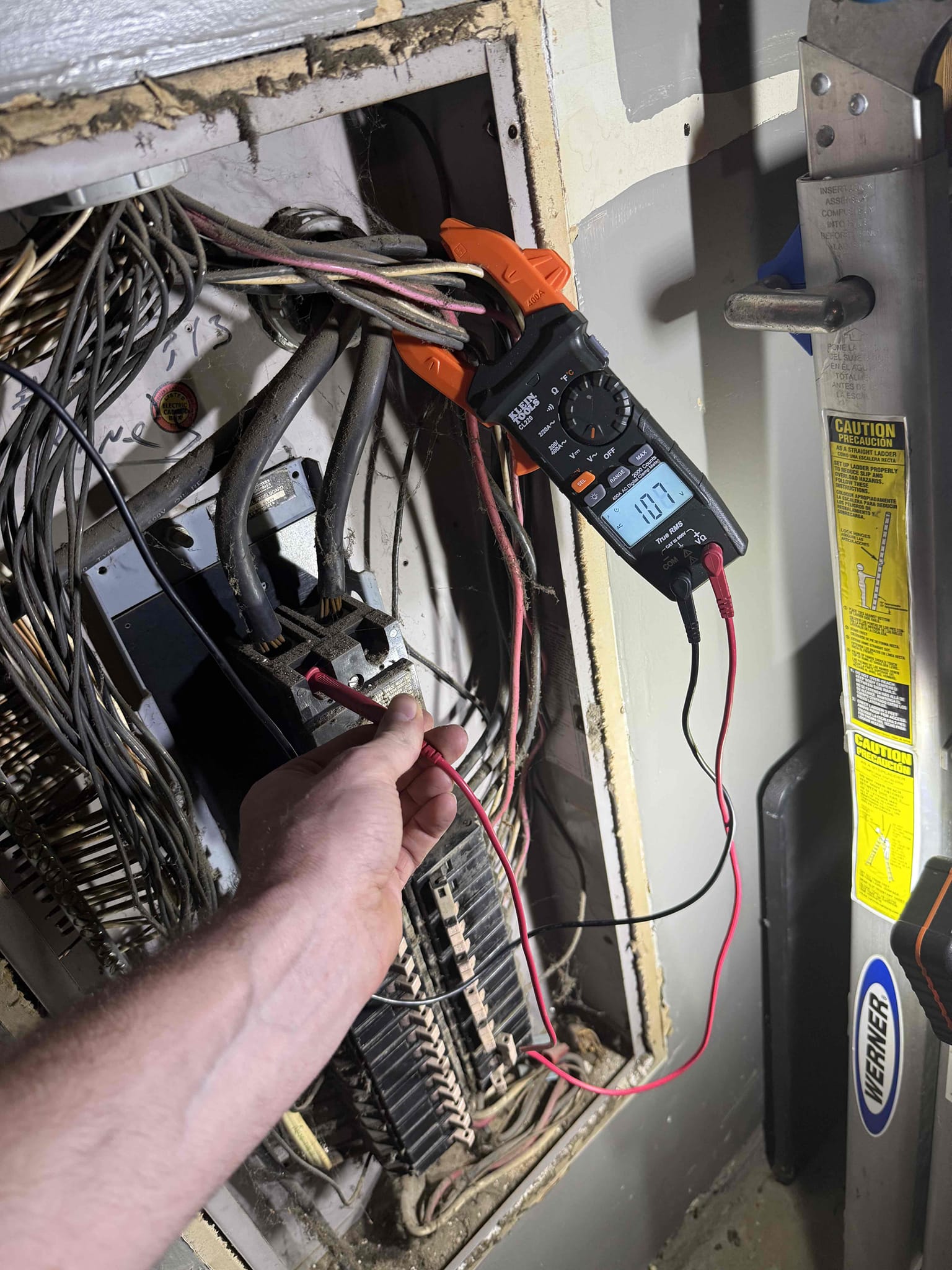 Customer is having issues with lights flickering throughout the house and did an amp draw and voltage check on the electrical panel and meter base. Randy microwave and on encore side coming into the house in the meter there was 99 V on one leg and 148 volts on the other leg. Called encore and they are coming out and just do not know what time they will be out here. Explained loose neutrals to customer.