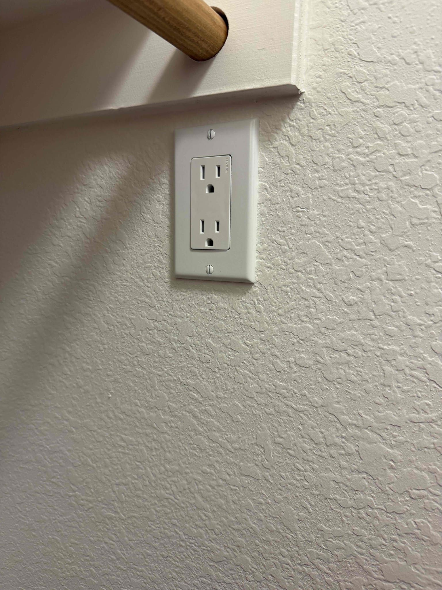 Arrived on the job site. The customer requested the installation of two outlets — one outside and one inside. For the exterior outlet located by the back door, installed a bell box extension ring with a ½-inch EMT conduit and added a new bell box by the eave for the outlet. Everything was tested and is working properly, with full GFCI protection.

For the interior outlet, installed it inside the closet of the front entry office (to the far right), intended for security camera use. Tapped power from the existing outlet on the opposite side of the wall. All work was completed successfully and tested. The customer understands that the installation includes a five-year warranty and is 100% satisfied with today’s service.