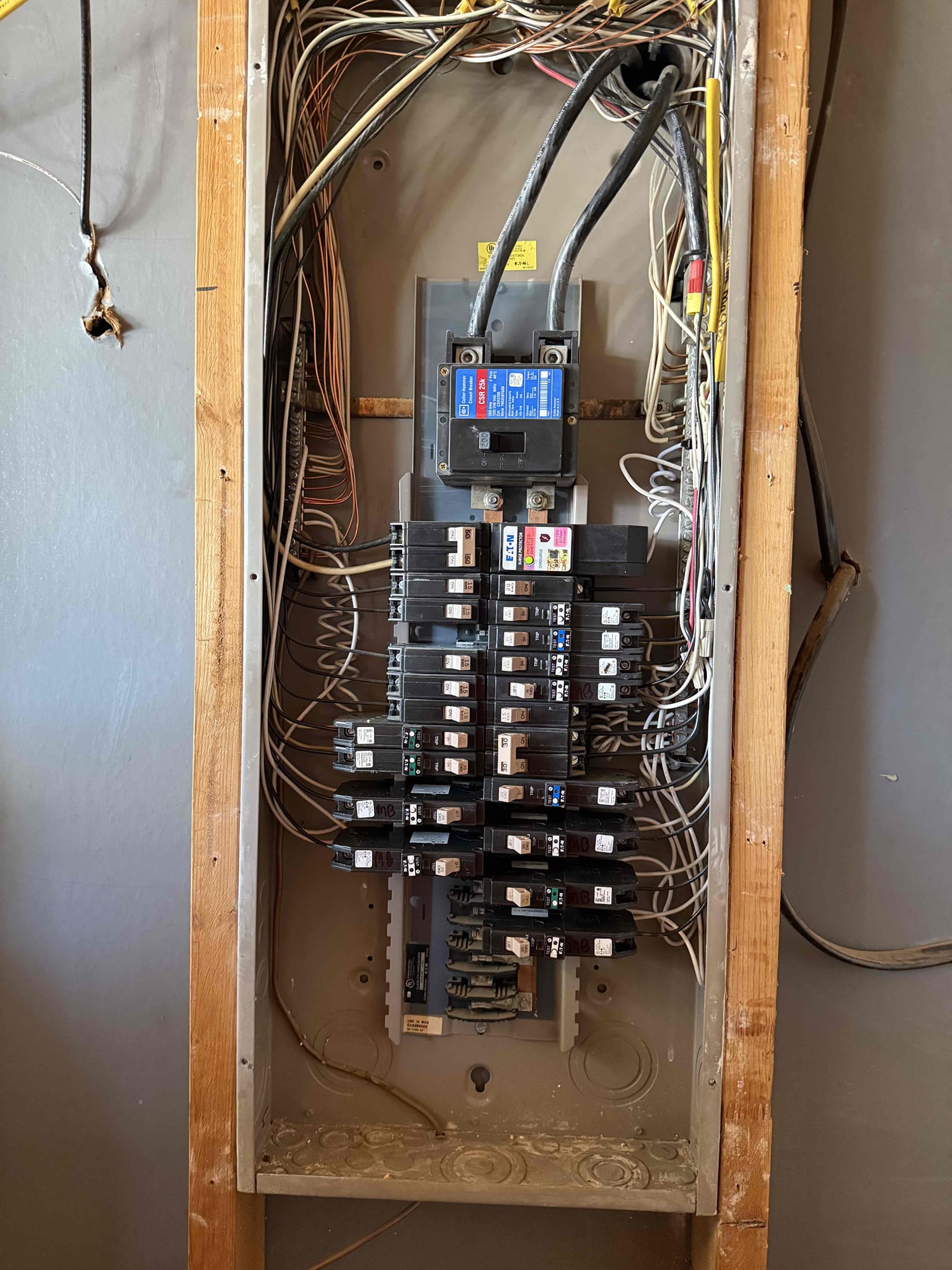 1. Pull j-box up into attic 
2. Refeed panel in attic for bedroom circuit 
3. Install 4 gfci breakers 
4. Install 1 arc fault breaker 
Customer was remodeling his garage and already pre-wired all the outlets that he needed to install. Customer only wanted me to install the breakers in the electrical panel. Explain to customer that he gets a five-year warranty on the breakers but nothing else in the garage.