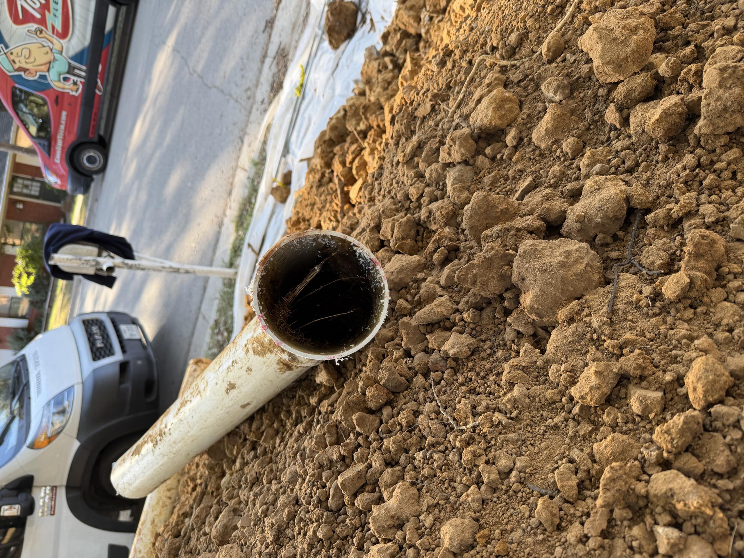 - attempt to pop clog in main sewer line between home and street.

- was able to pop clog , did explain to customer that the cable was binding up and there are definitely bigger issues in the drain. Supervisor is on his way out.

- preform camera inspection from cleanout in front of home all the way to the city to check piping for any issues that need repair.

** solutions will be given for any issues found **
Call city to locate all utilities 
Saw cut, bust out and haul off concrete
Excavate to expose failed sewer line 
Cut out failed section and repipe in schedule 40 pvc
Salt treat transitions to deter root growth 
Backfill and compact 
Pour concrete back to finished grade
15 year parts and labor warranty on pipe installed 