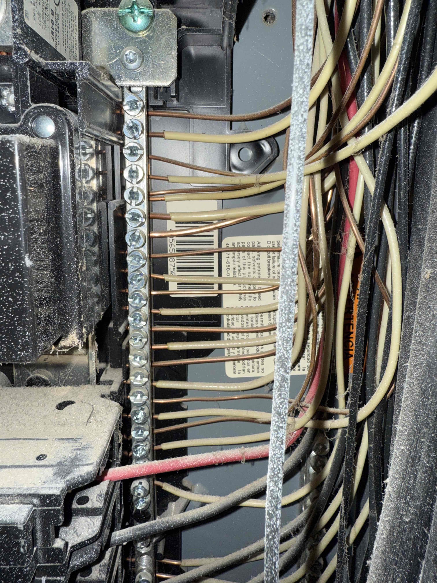 Arrived on-site to complete a whole-home safety inspection. Inspected all areas throughout the house and identified several code violations and concerns that need to be repaired. One issue is double-lugged neutrals and grounds inside the panel, which need to be separated into their own individual lugs. This can cause connection issues and result in improper power distribution due to loose or incorrect wiring.

Additionally, there is a single-pole breaker installed that is not UL-listed for a Square D Homeline panel, which will need to be replaced with a proper listed breaker. I also found an exposed large Romex cable running from the conduit to the ground outside. It appears to go under the patio set, but it’s unclear what it controls. This cable needs to be capped off or properly terminated in a weatherproof box.

Noticed as well that the four hardwired smoke detectors in the bedrooms are not connected to their harnesses. They are not battery-operated units, so they will need to eithe