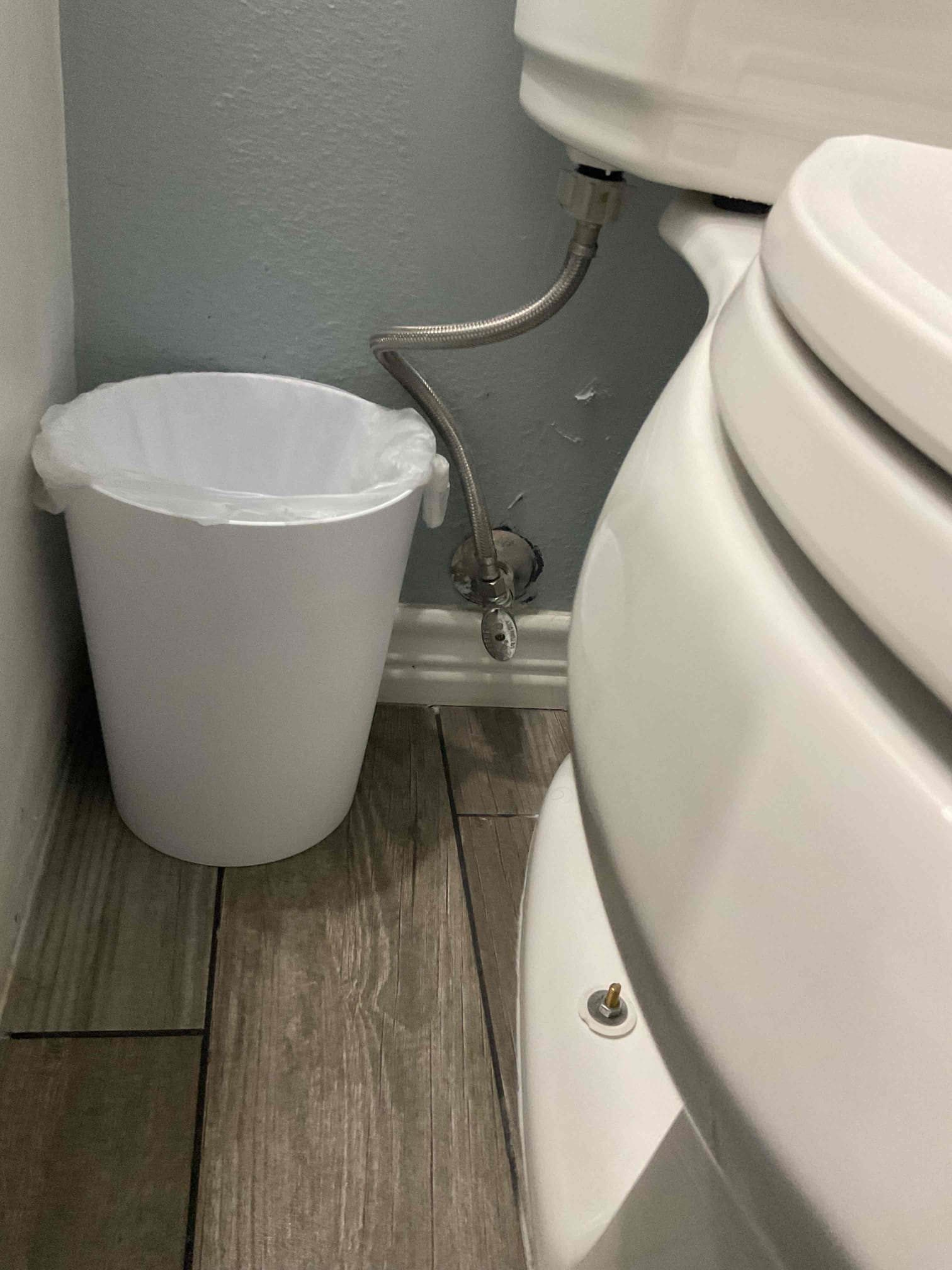 Ran closet auger through toilet. Before starting work advised customer about existing scratches on porcelain. Toilet is currently flushing, but is making a gurgling sound, which indicates that a blockage is still present. Recommended pulling toilet and performing a camera inspection. No further work was authorized at this time. 