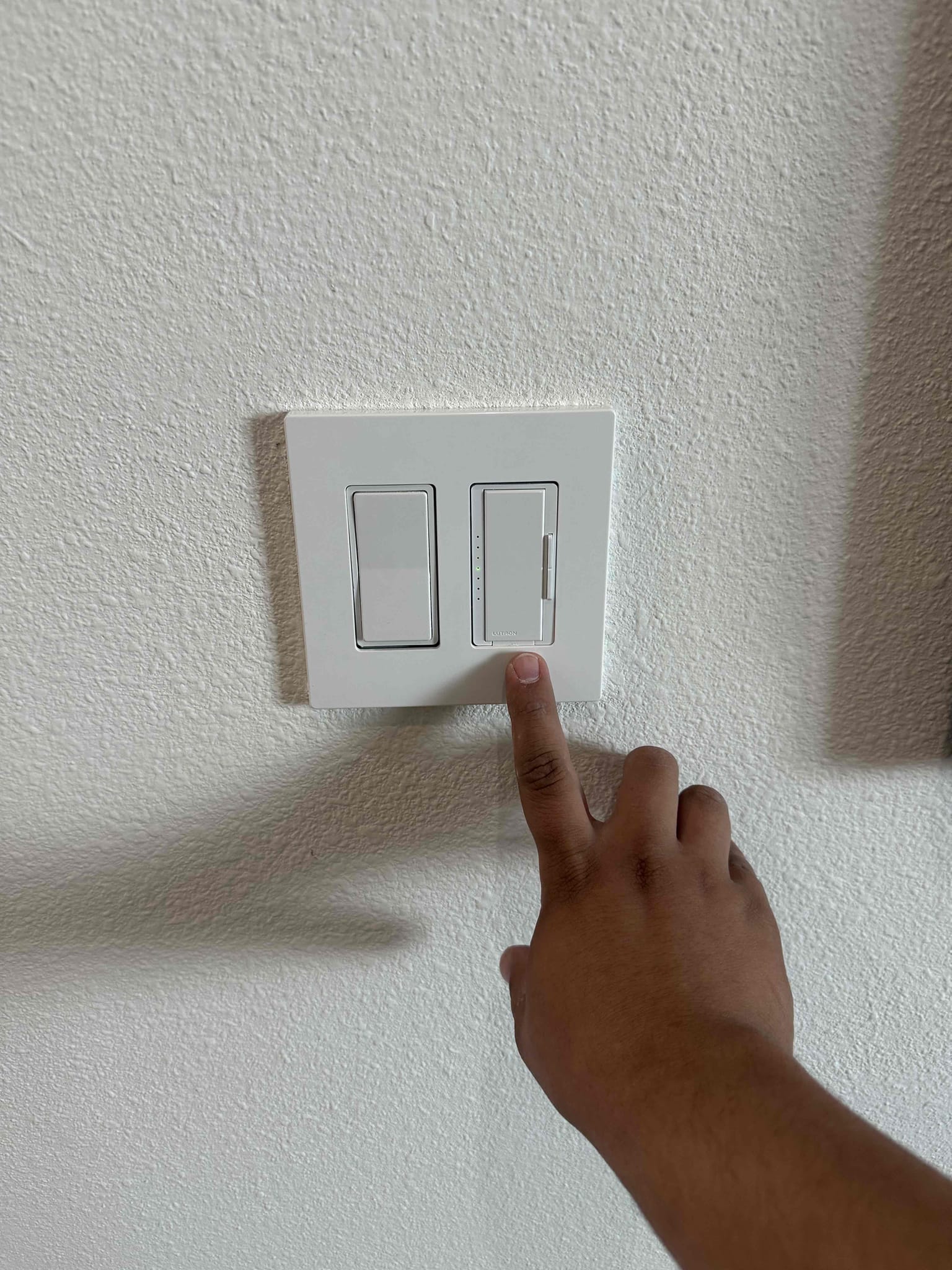 Arrived on the job site, and the customer requested two pendant lights to be installed over the kitchen island. I also installed the customer-supplied devices, which included two Lutron Maestro single-pole dimmer switches—one for the middle stairway bathroom and one for the guest bathroom. The first dimmer controls the lights over the door area, and the second controls the lights over the toilet and vanity. I also installed another dimmer switch on the third floor that controls the single hallway light leading to the bedroom and bathroom. Also replaced the customer-supplied transformer to ensure the doorbell camera operated properly.

I walked the customer through all the work so he understands how everything functions. The customer has a five-year warranty on all connections, excluding customer-supplied materials. The customer is 100% happy and satisfied with today’s visit.