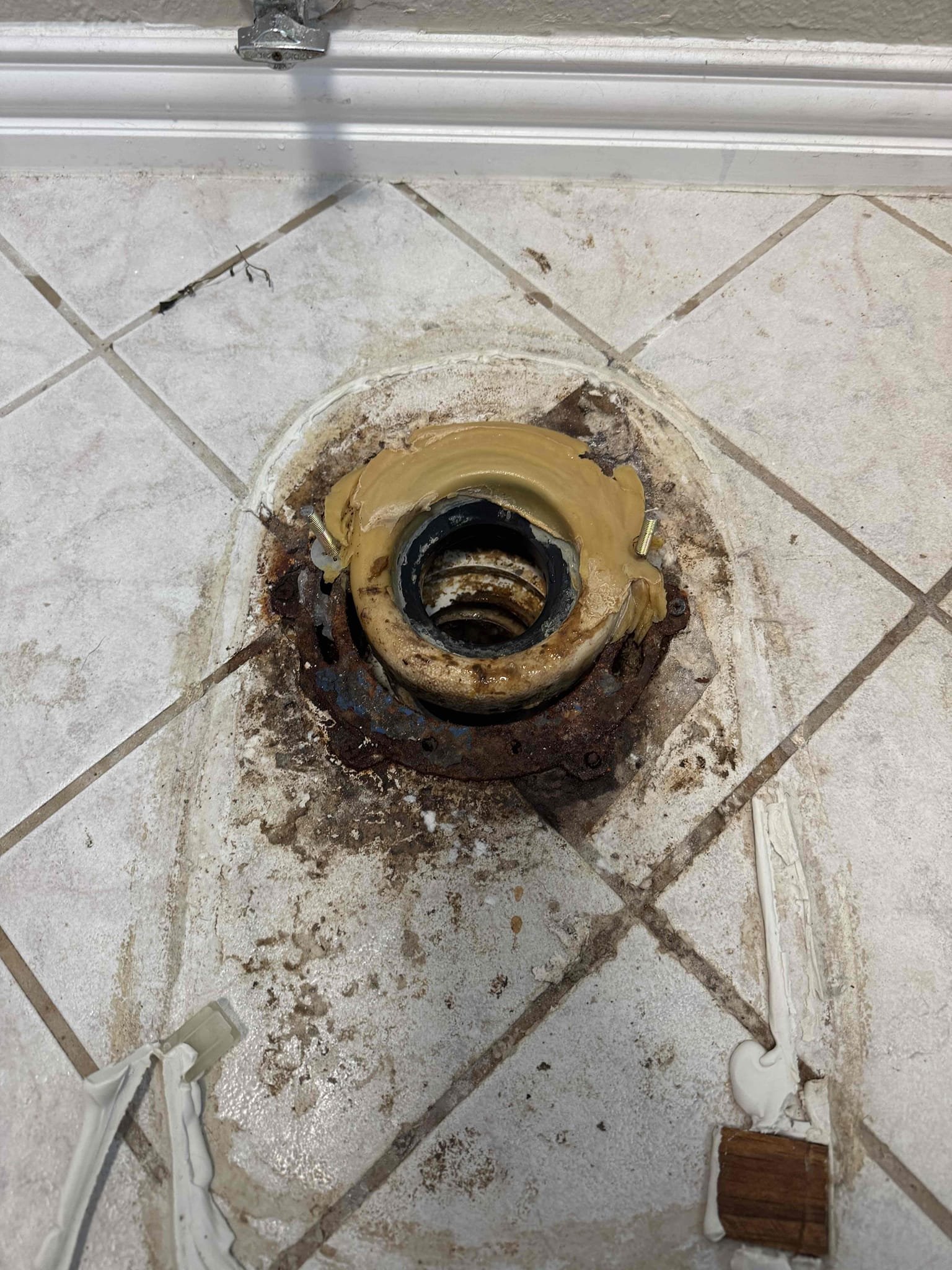 Due to failed static test on sewer system perform pin point testing to locate the leaking sewer connections under the slab. Pull and reset both toilets, Replace master bath toilet with customer supplied toilet. Replace emergency shutoff and supply line. After work is complete reset the second toilet. Replacing wax seal, closet bolts, water supply lines. If flanges need to be repaired then an additional estimate will be presented. 