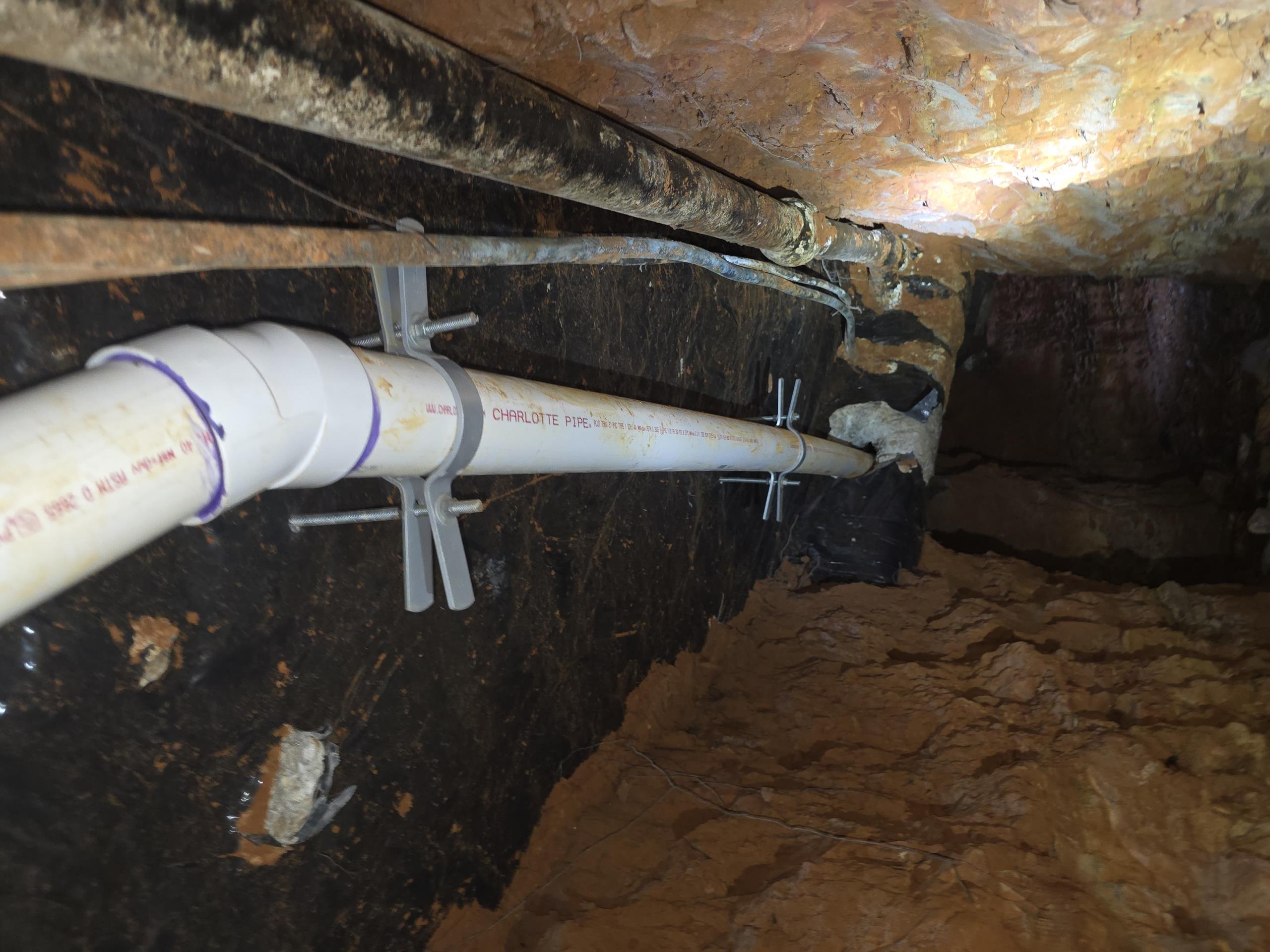 Gain access to the underside of the slab by digging 3 access holes, one in the front of the home, one in the laundry room floor and one in the backyard.
Tunnel under the home to expose all drains for both bathrooms, kitchen, laundry and the mainline totaling 95 ft of tunnel
Once exposed, we will cut out all the drains and repipe in schedule 40 pvc
Anchor pipe to the underside of the slab with anchors and loop hangers
Install new dual sweep cleanouts outside
Pull all necessary permits and have the work inspected by the city inspector
Backfill all earth
15 year parts and labor warranty 