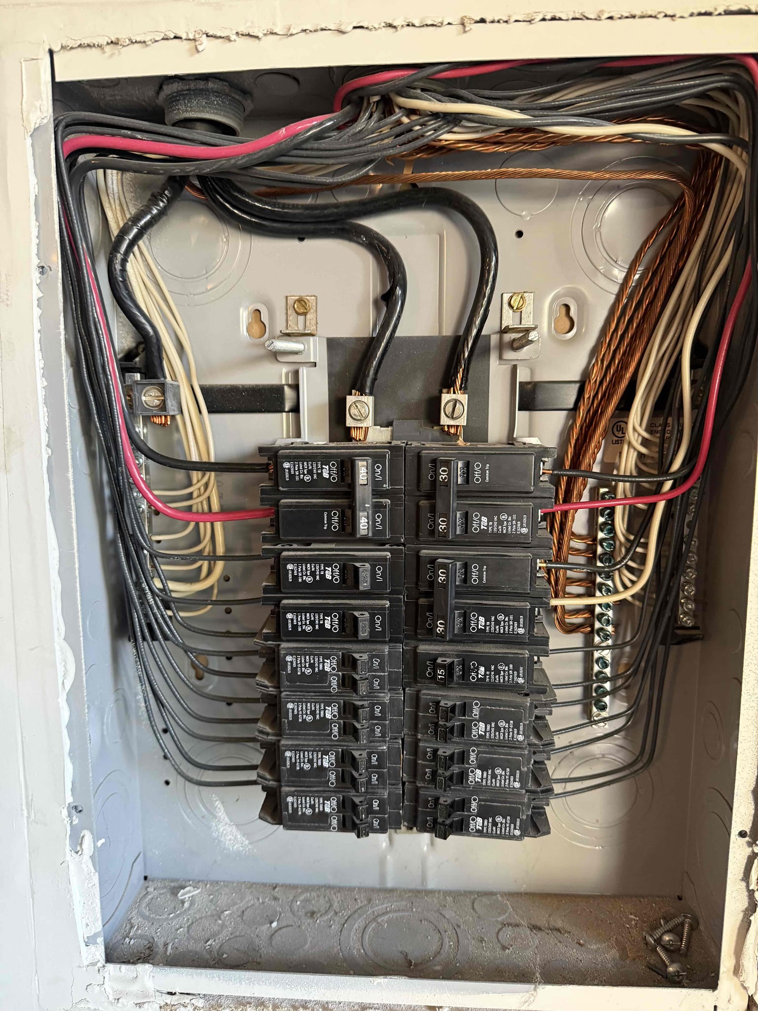 Troubleshooting breaker and checked voltage coming into panel and breakers. found that there was an internally tripped tandem breaker and cut off and back on and everything worked with no issues. The problem happened during a storm. Also found that customer was making code and that 1 leg coming into panel had 130v on it when the coffee maker was running. Explained to customer she will need to have oncore out. Also explained that the breakers are outdated and need to be replaced due to age. If we have to come out for same problem we will automatically charge for a troubleshoot, including troubleshooting the meter base. 